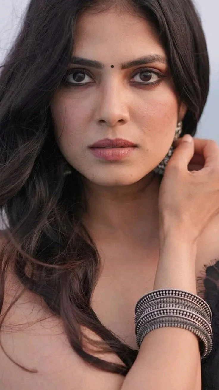Sultry Malavika Mohanan Focused Intense Portrait Shot Image