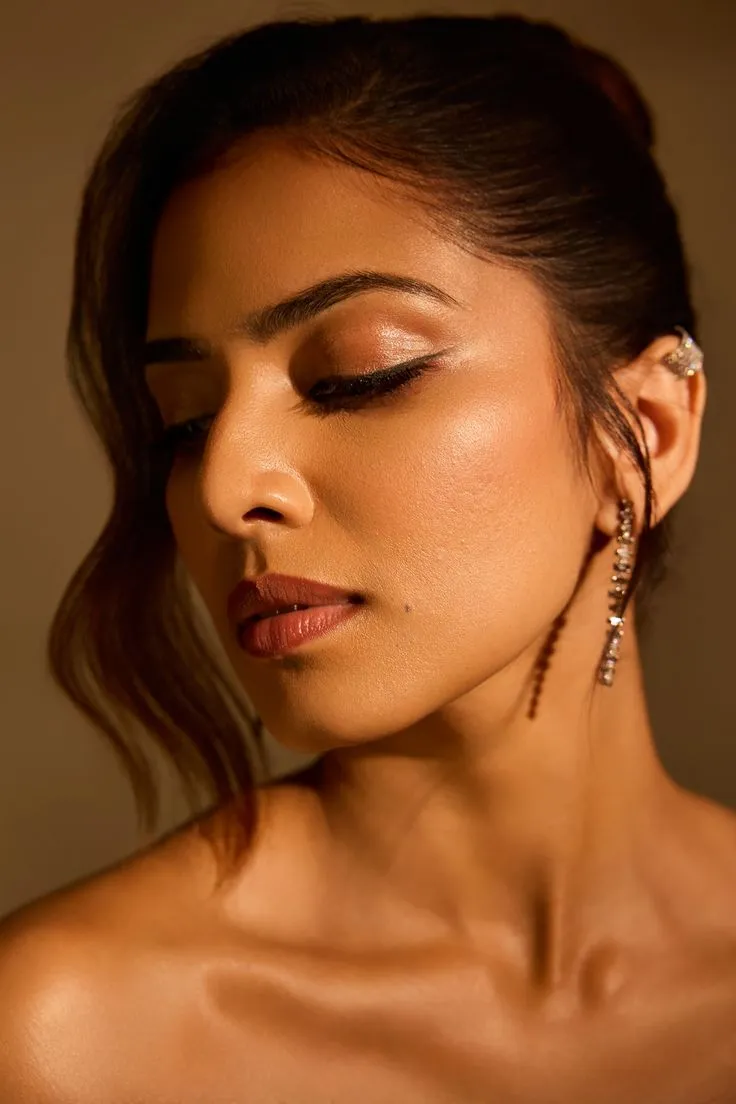 Sultry Malavika Mohanan Golden Outfit Side Profile Look