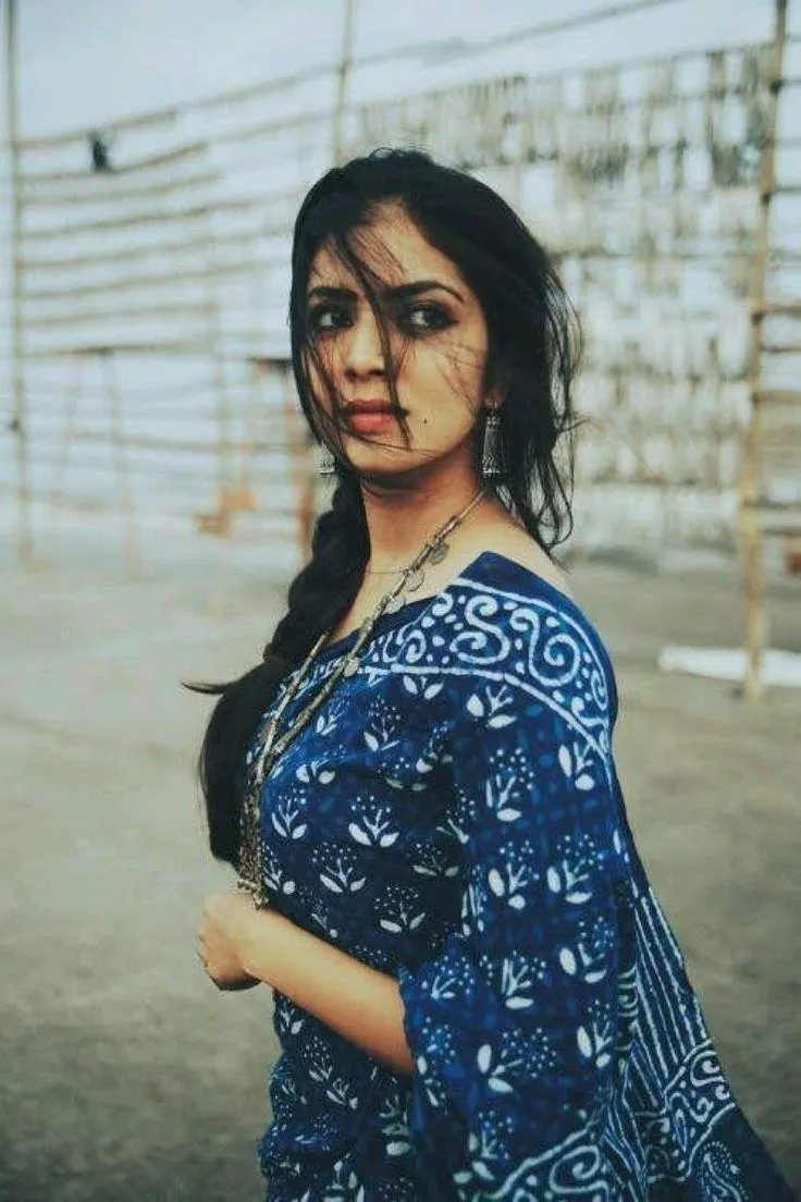Sultry Malavika Mohanan in Blue Saree Stunning Portrait