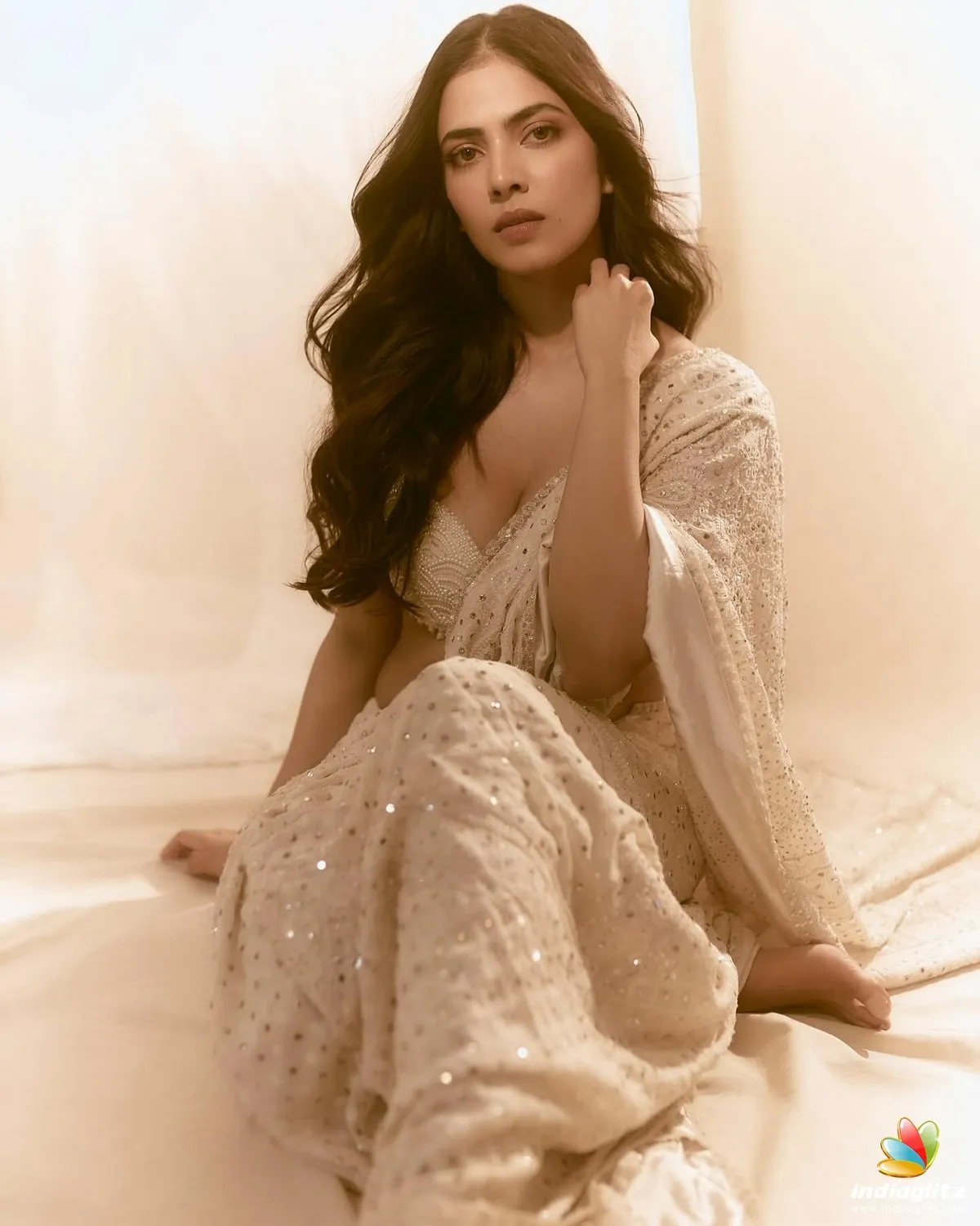 Sultry Malavika Mohanan in Dreamy White Soft Lighting Image
