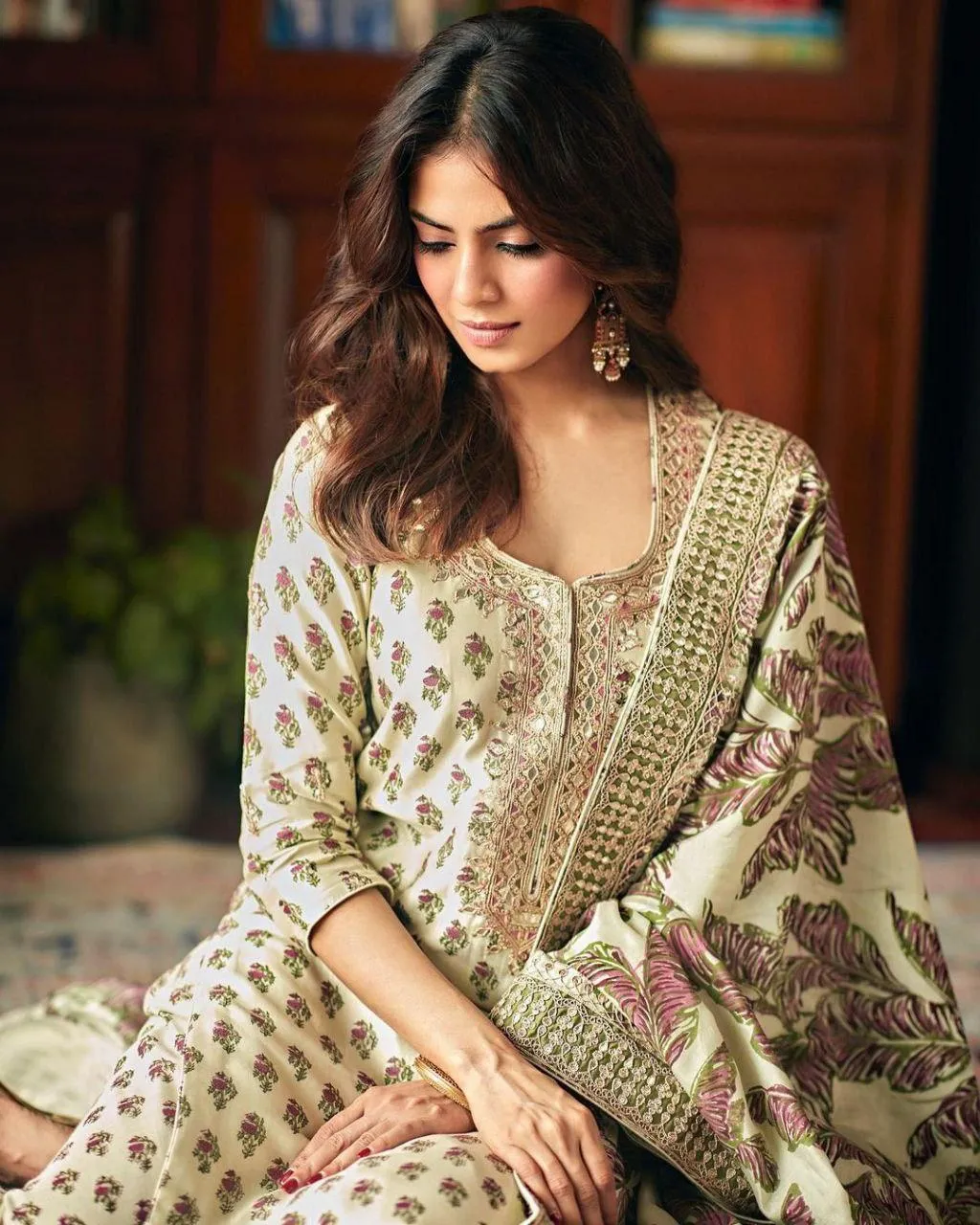 Sultry Malavika Mohanan in Ethnic Saree Seated Graceful
