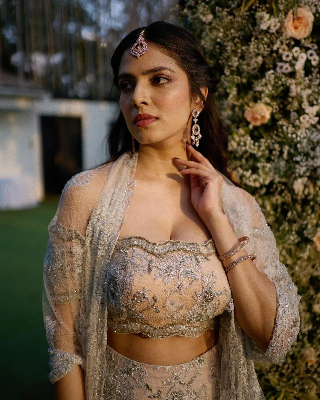Sultry Malavika Mohanan in Golden Blouse with Bold Earrings
