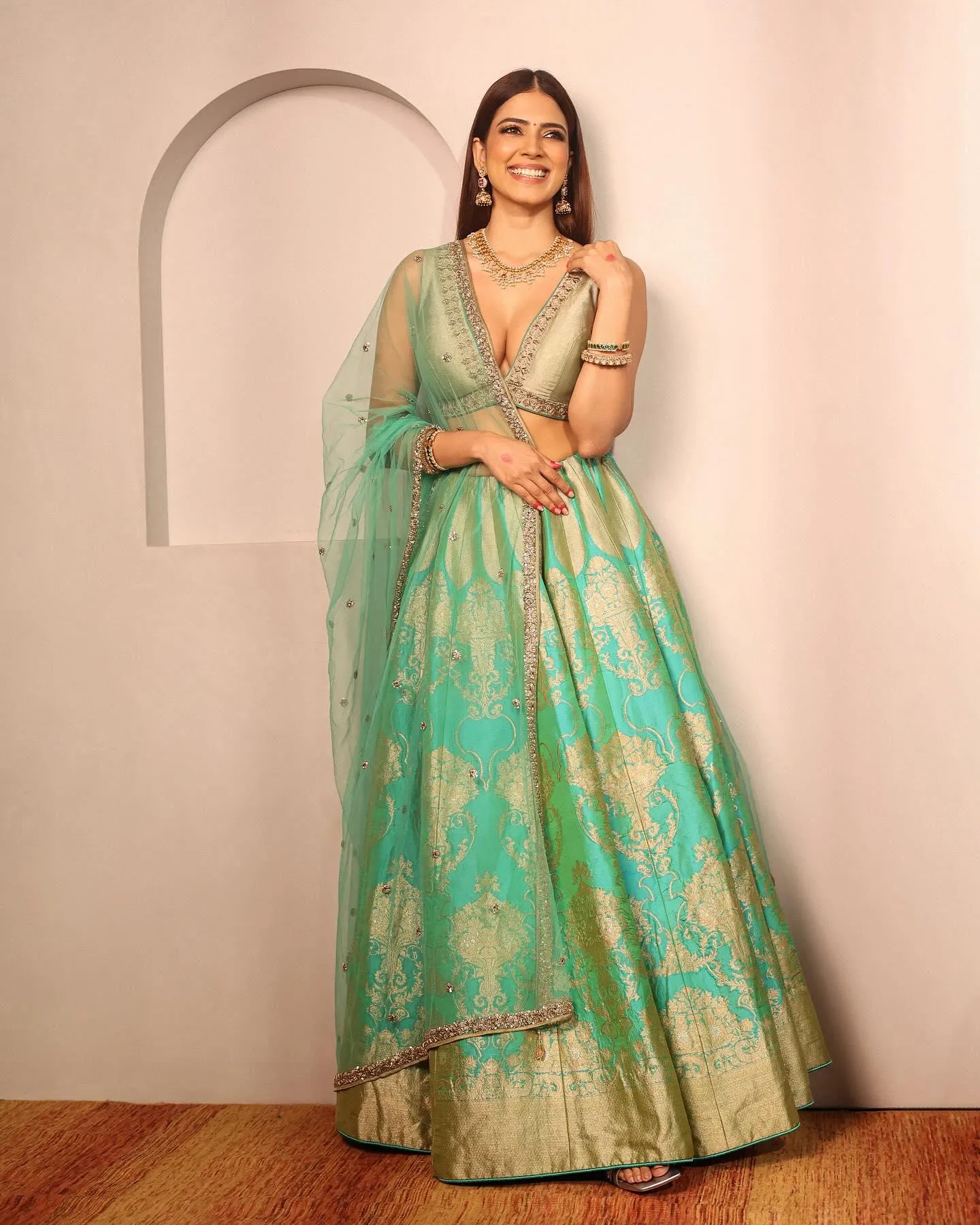 Sultry Malavika Mohanan in Green Lehenga Full Body Pose