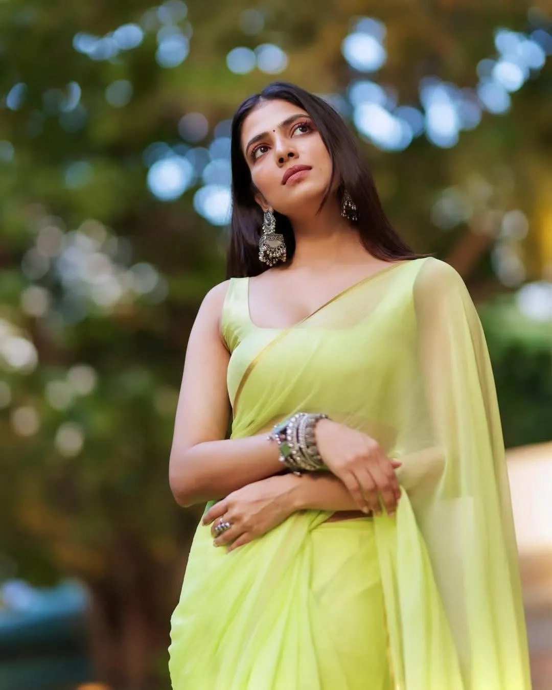 Sultry Malavika Mohanan in Neon Yellow Saree Elegance