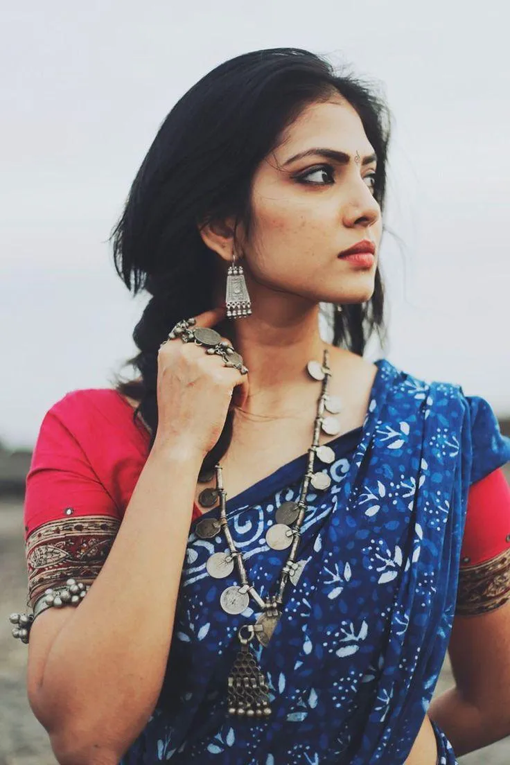 Sultry Malavika Mohanan in Red Dress Side Confident Pose