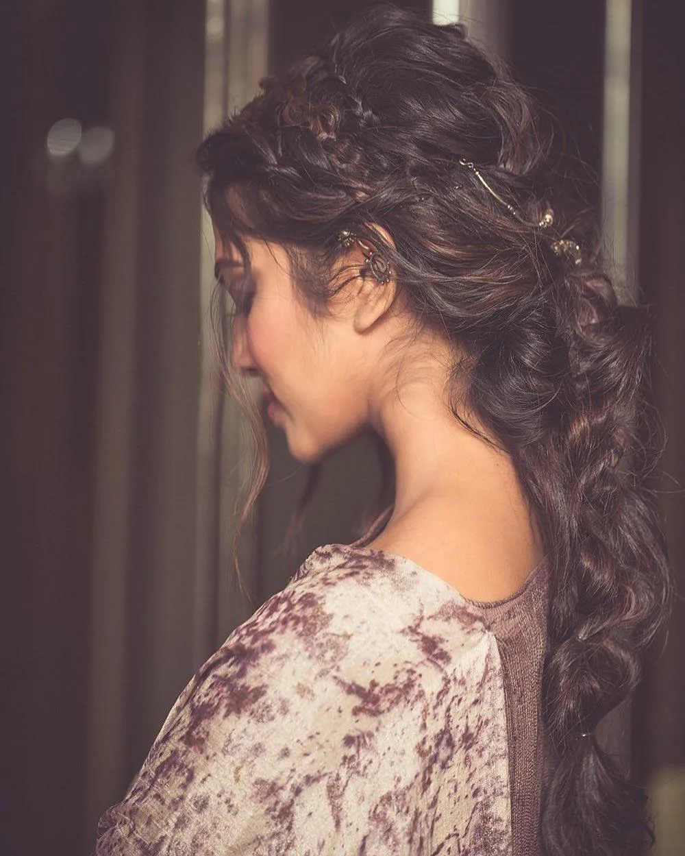 Sultry Malavika Mohanan Looking Back Wearing Dark Outfit