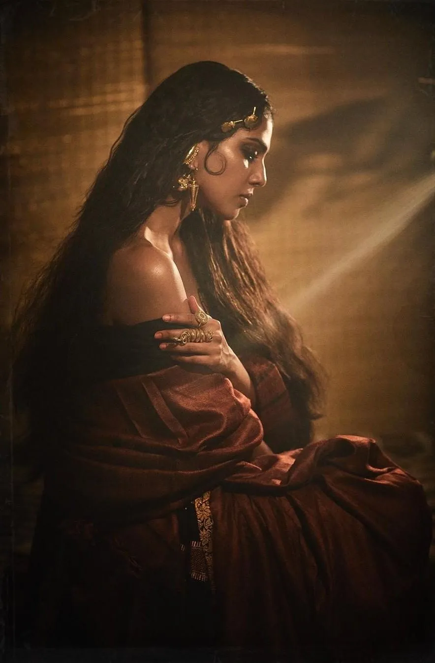 Sultry Malavika Mohanan Posing in Dramatic Low Light Scene
