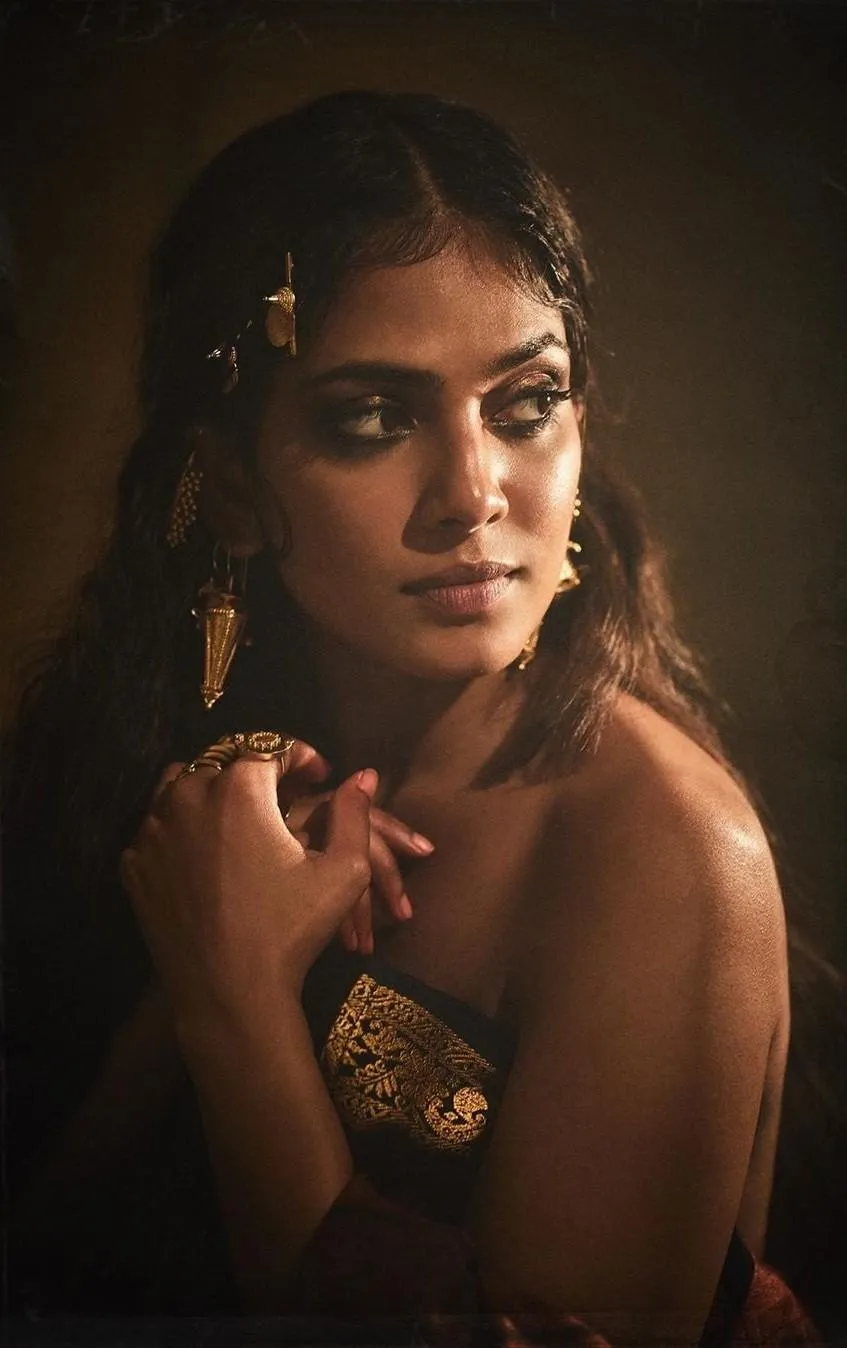 Sultry Malavika Mohanan Posing Wearing Dark Outfit Intense