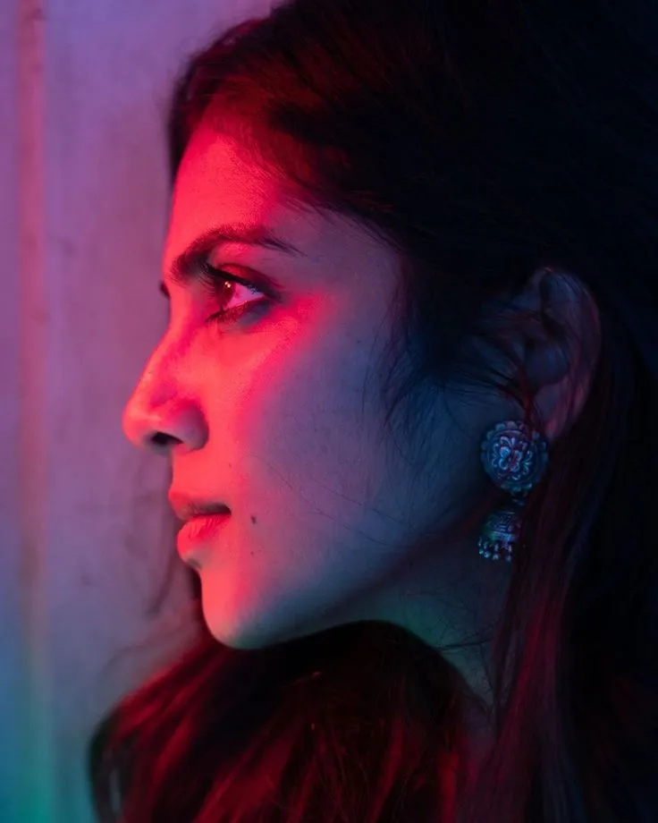 Sultry Malavika Mohanan Side Profile Glowing in Red Lighting