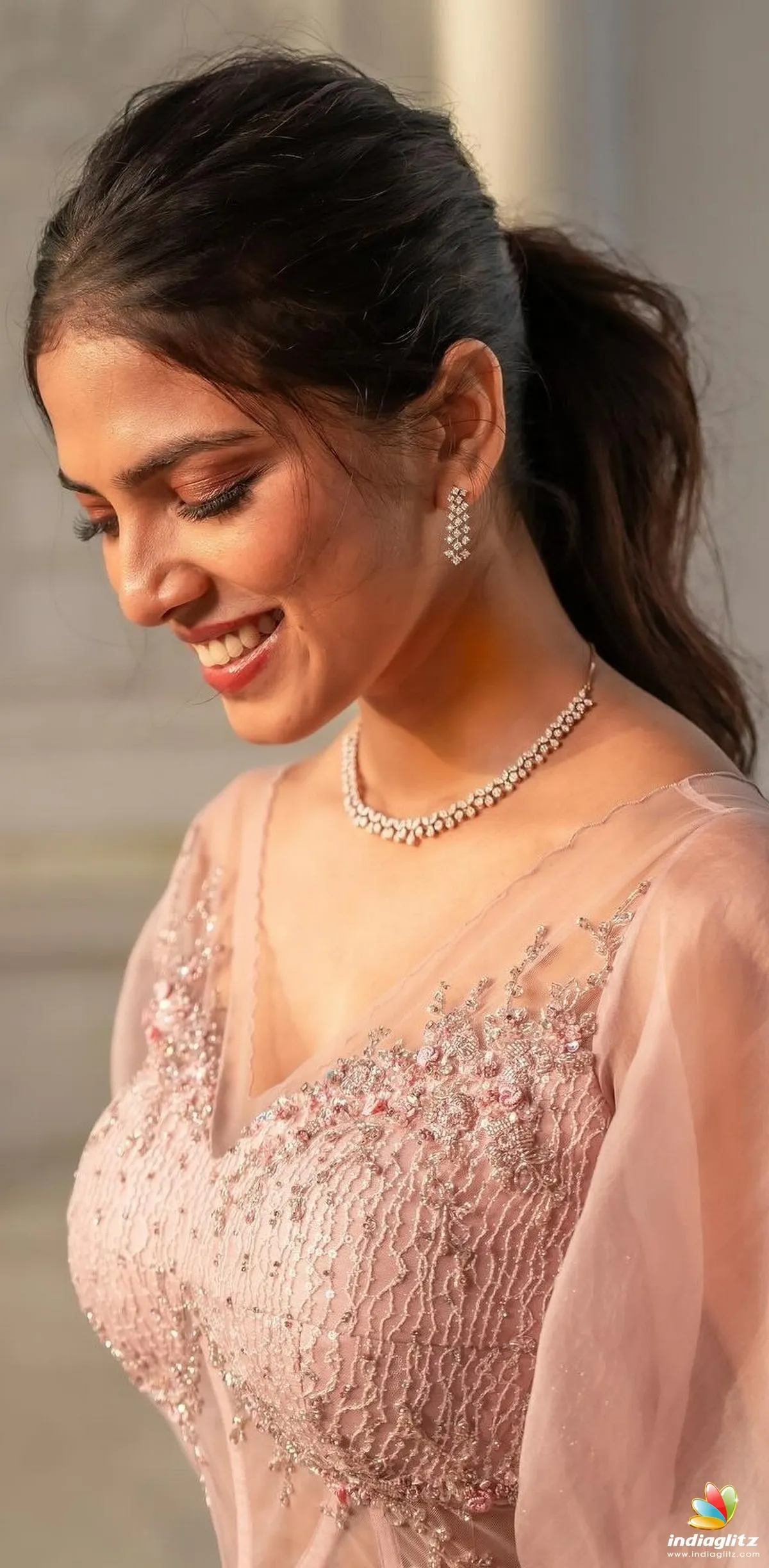 Sultry Malavika Mohanan Wearing Soft Pink Dress Indoors