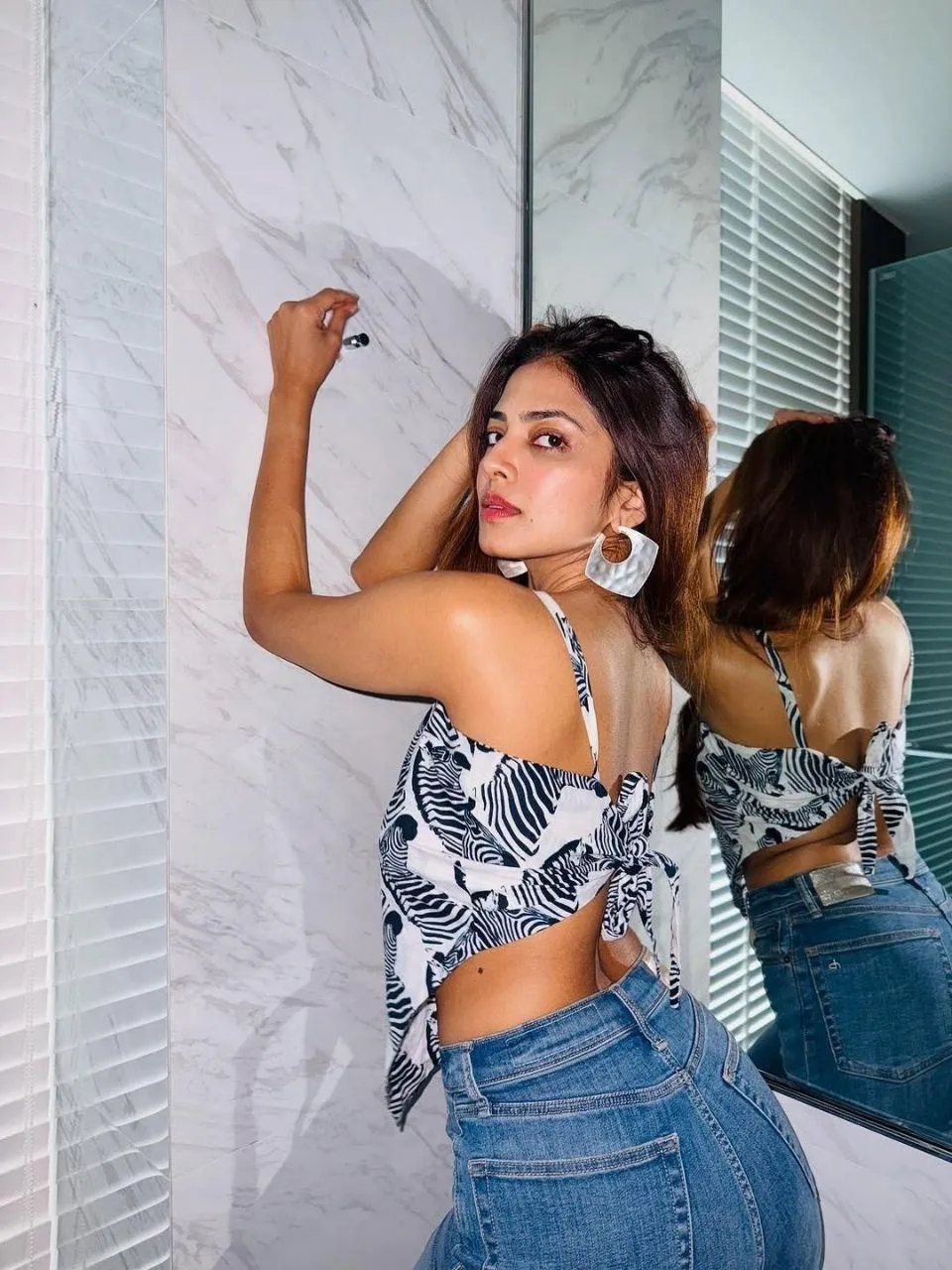 Tempting Malavika Mohanan Chic Style in Denim Crop Outfit