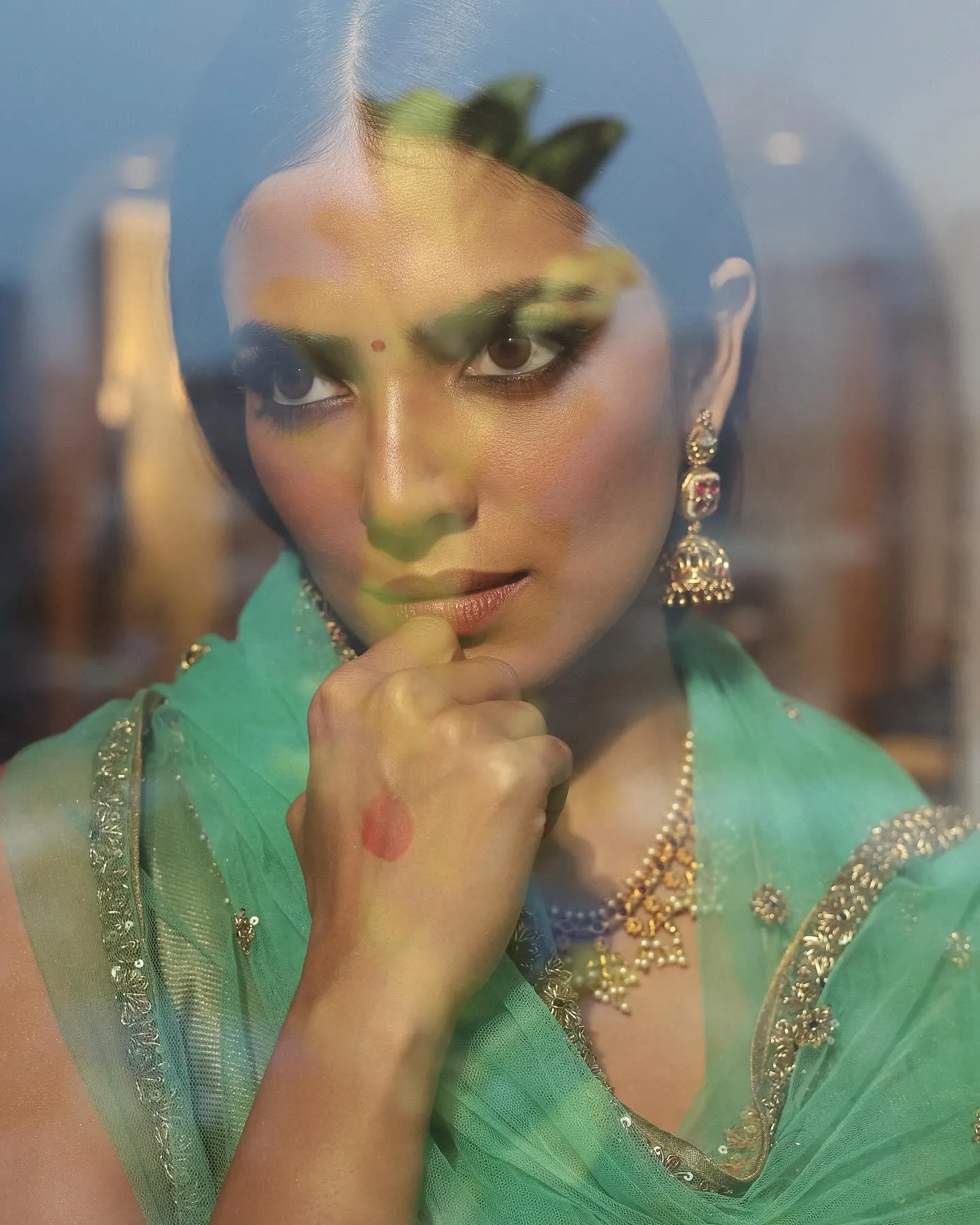 Tempting Malavika Mohanan in Green Lehenga Mirror Photo
