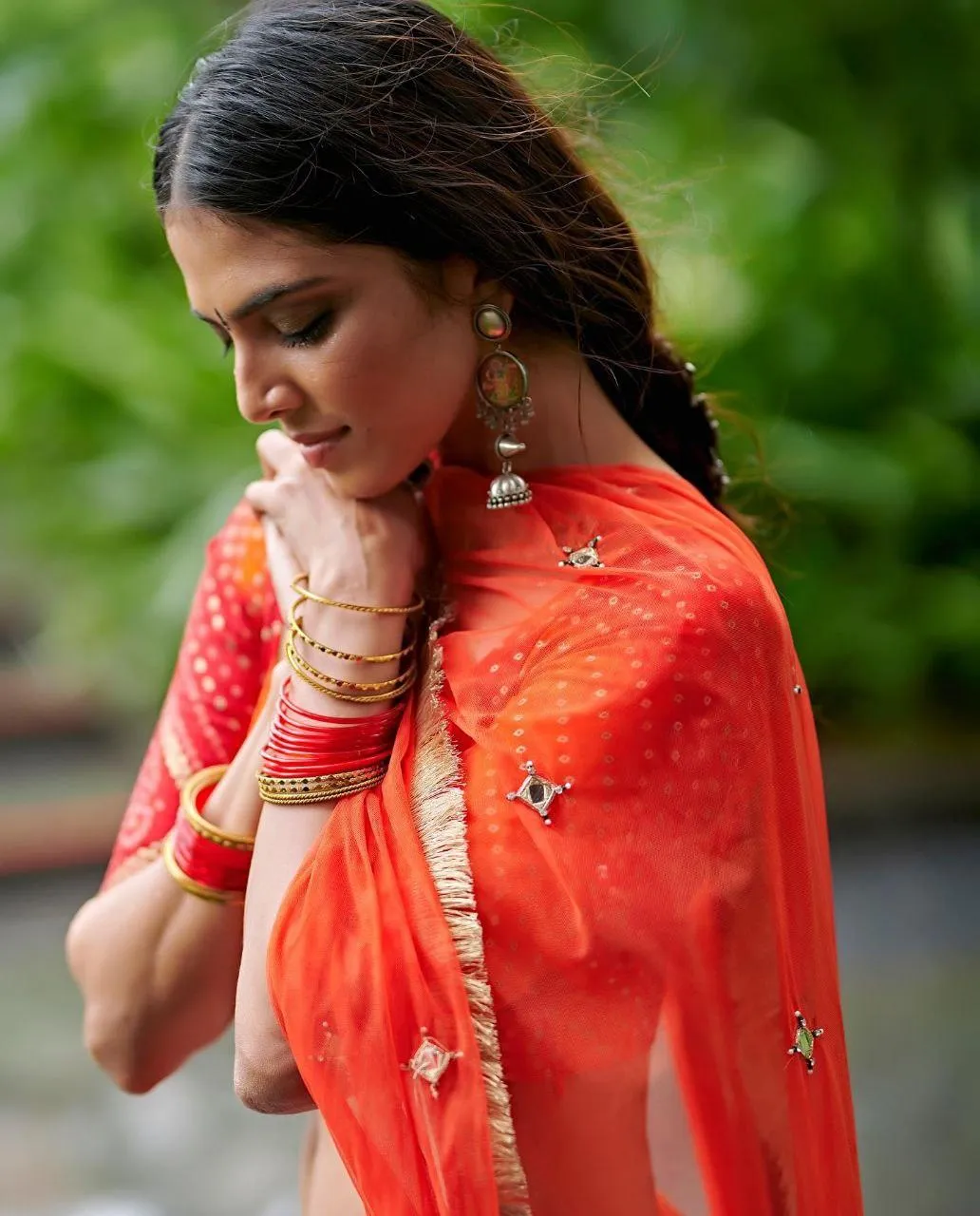 Tempting Malavika Mohanan in Red Ethnic Outfit Outdoors