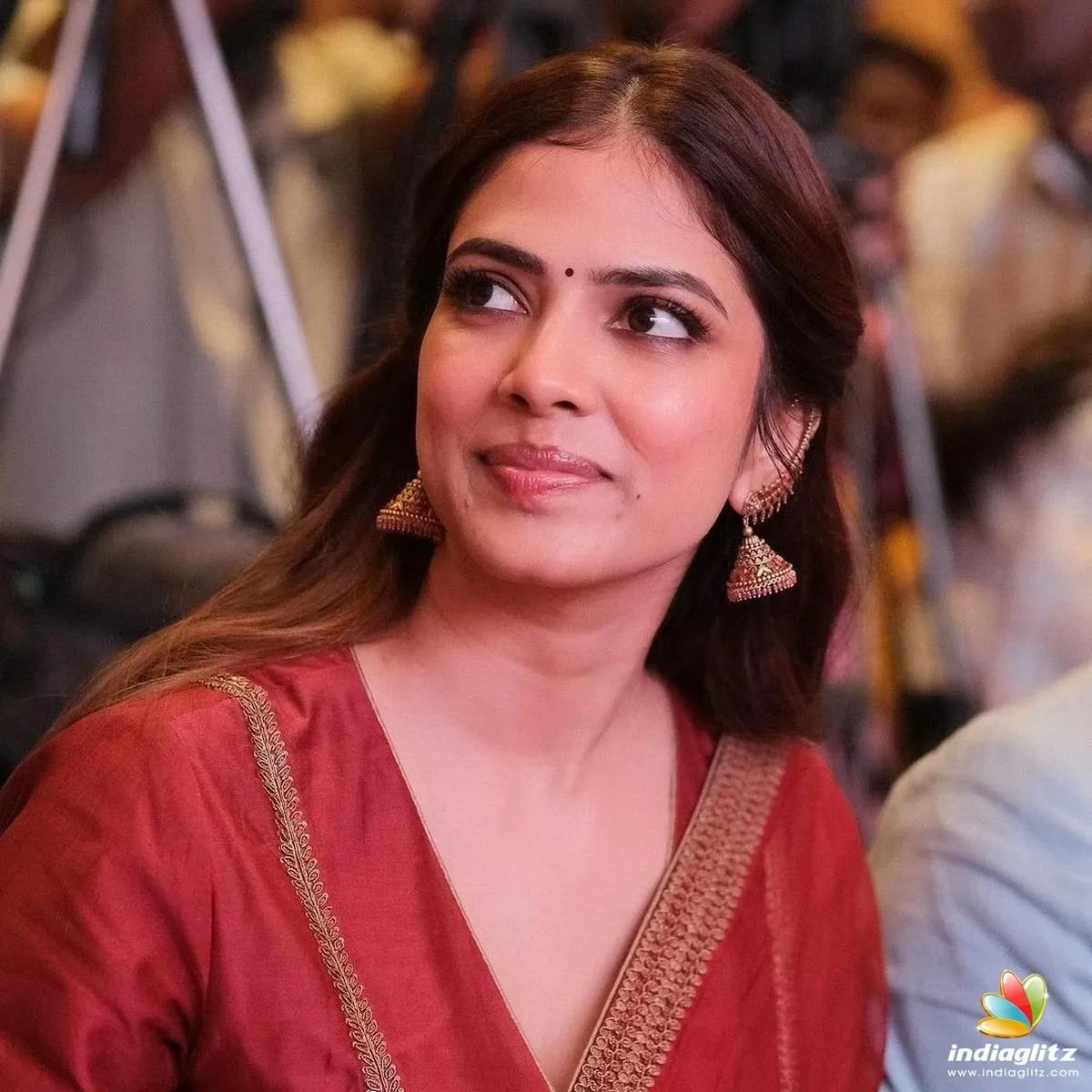 Tempting Malavika Mohanan in Red Saree Chic Cultural Pose