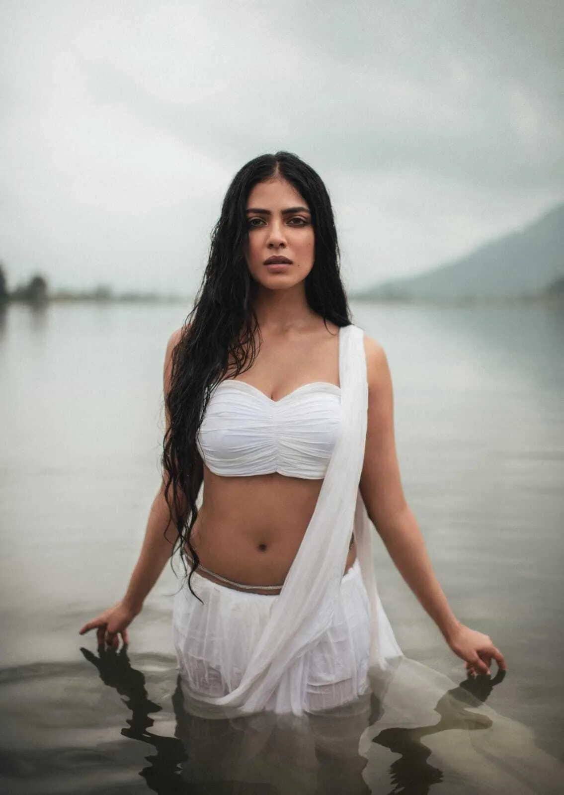 Tempting Malavika Mohanan in White Dress by Seaside Picture