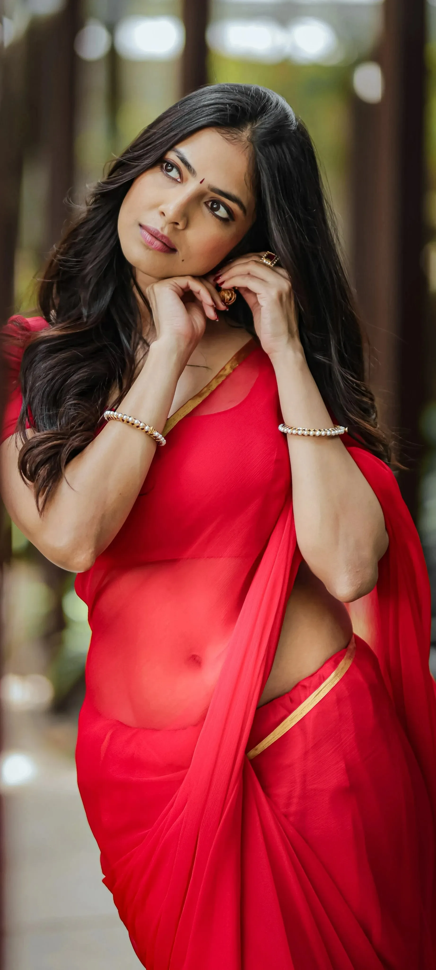Tempting Malavika Mohanan Wearing a Beautiful Red Dress