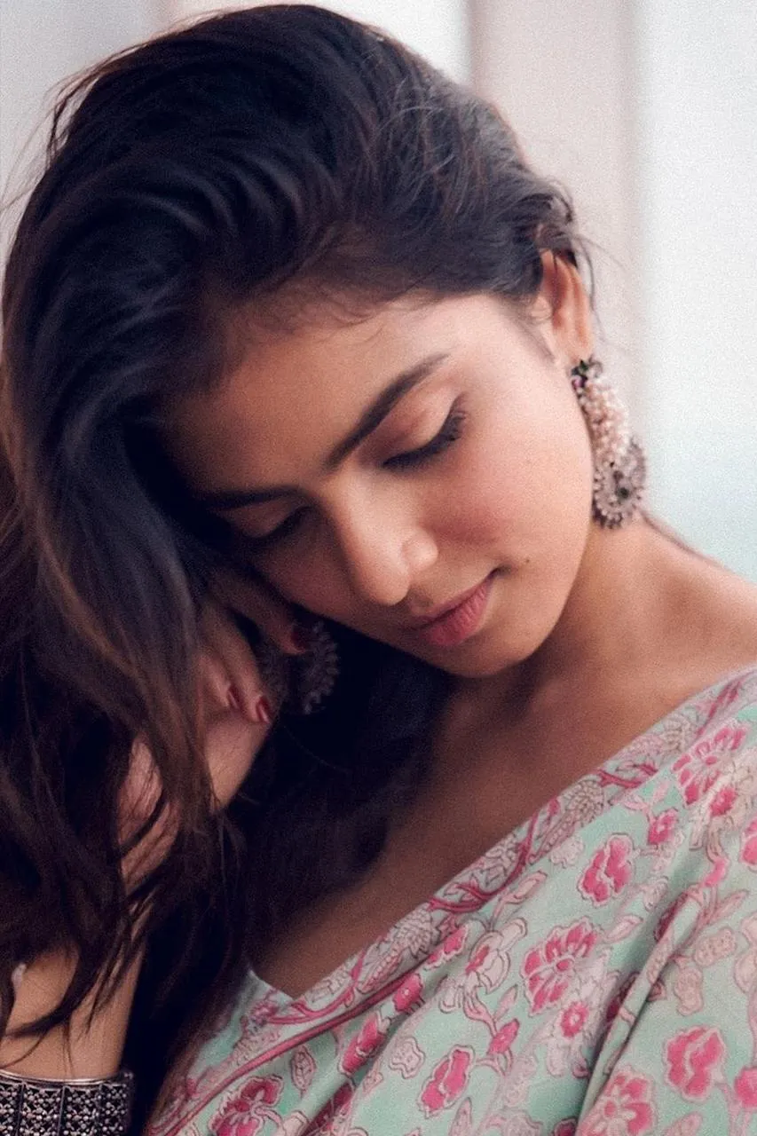 Tempting Malavika Mohanan Wearing Floral Dress with Smile