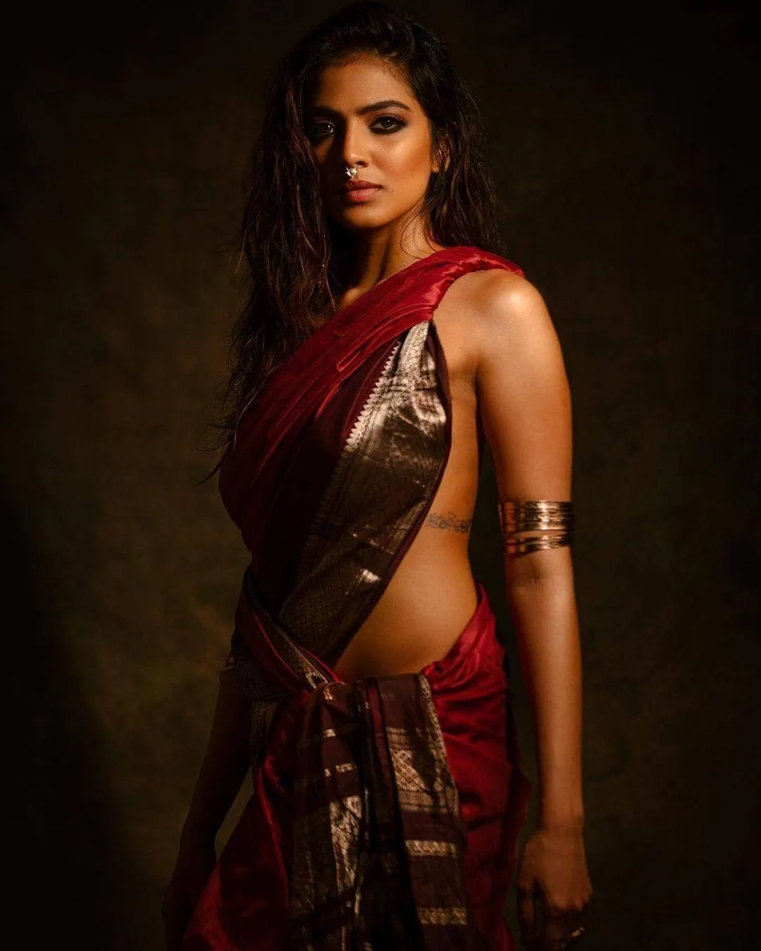 Traditional Look of Malavika Mohanan Bold in Red Saree Image