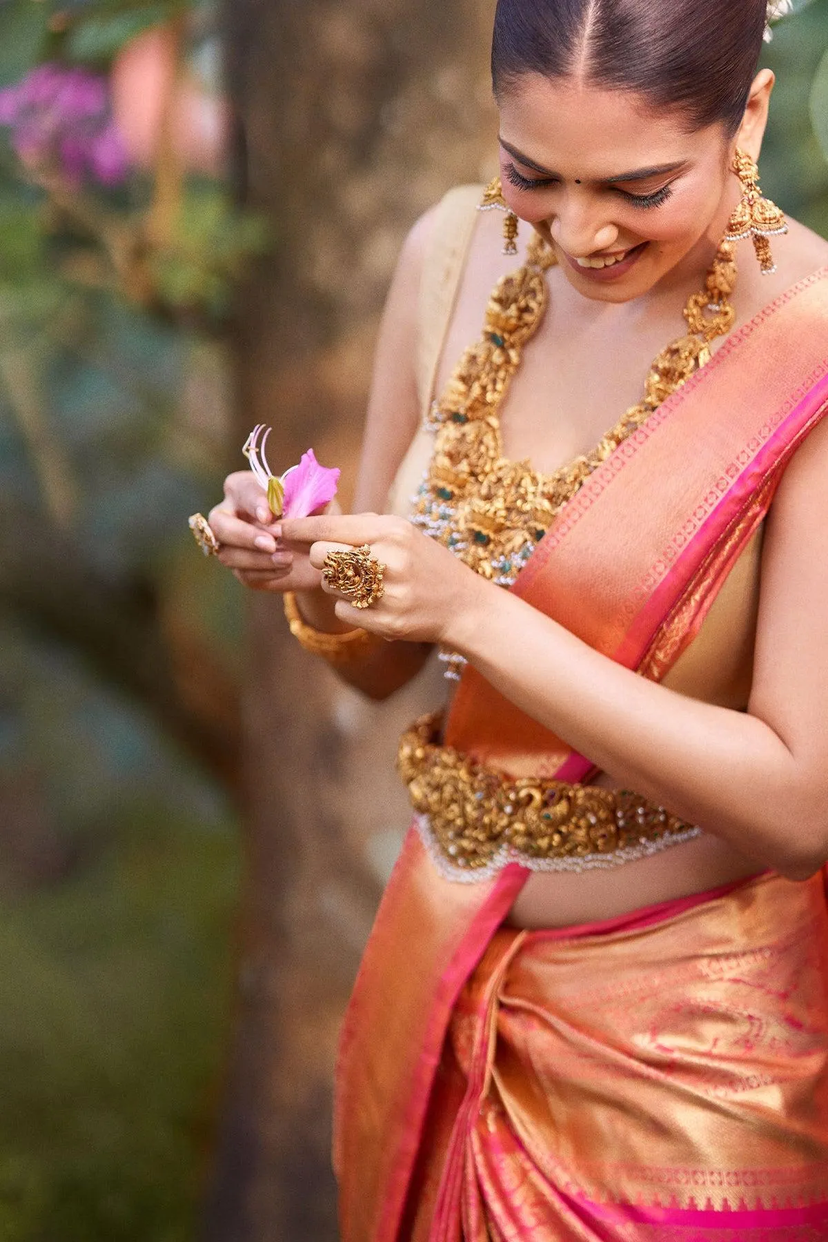 Traditional Look of Malavika Mohanan Radiant in Pink Saree