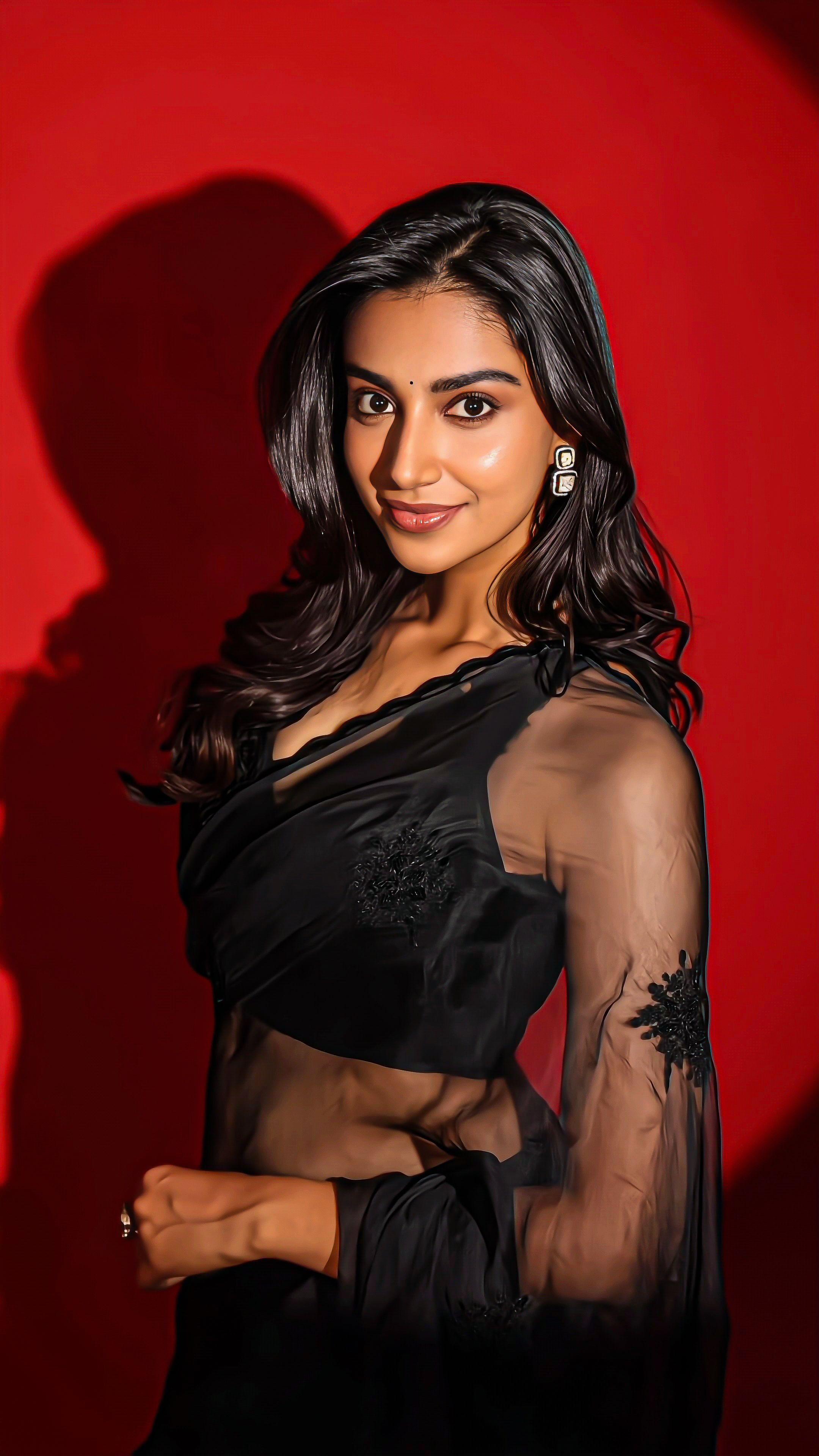 Meenakshi Chaudhary Black Saree Image