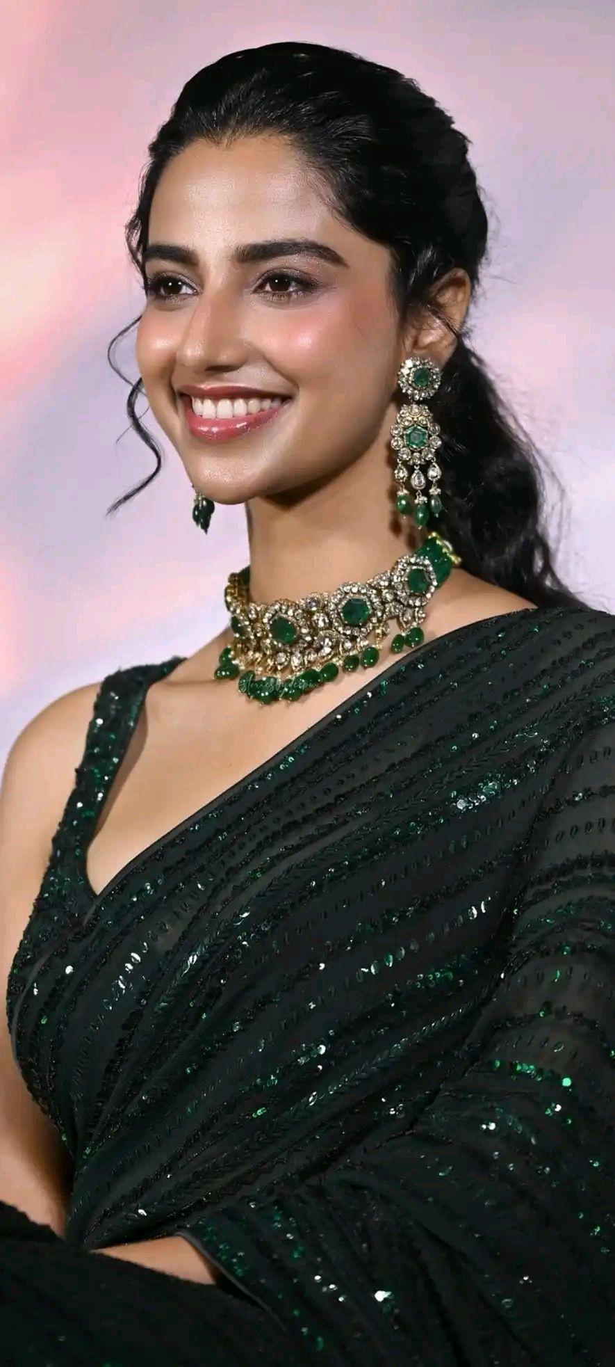 Meenakshi Chaudhary Green Saree HD Image