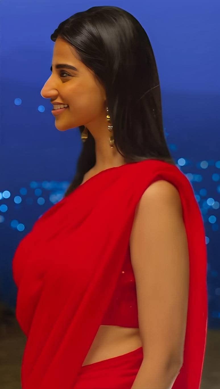 Meenakshi Chaudhary in Red Saree HD Wallpaper
