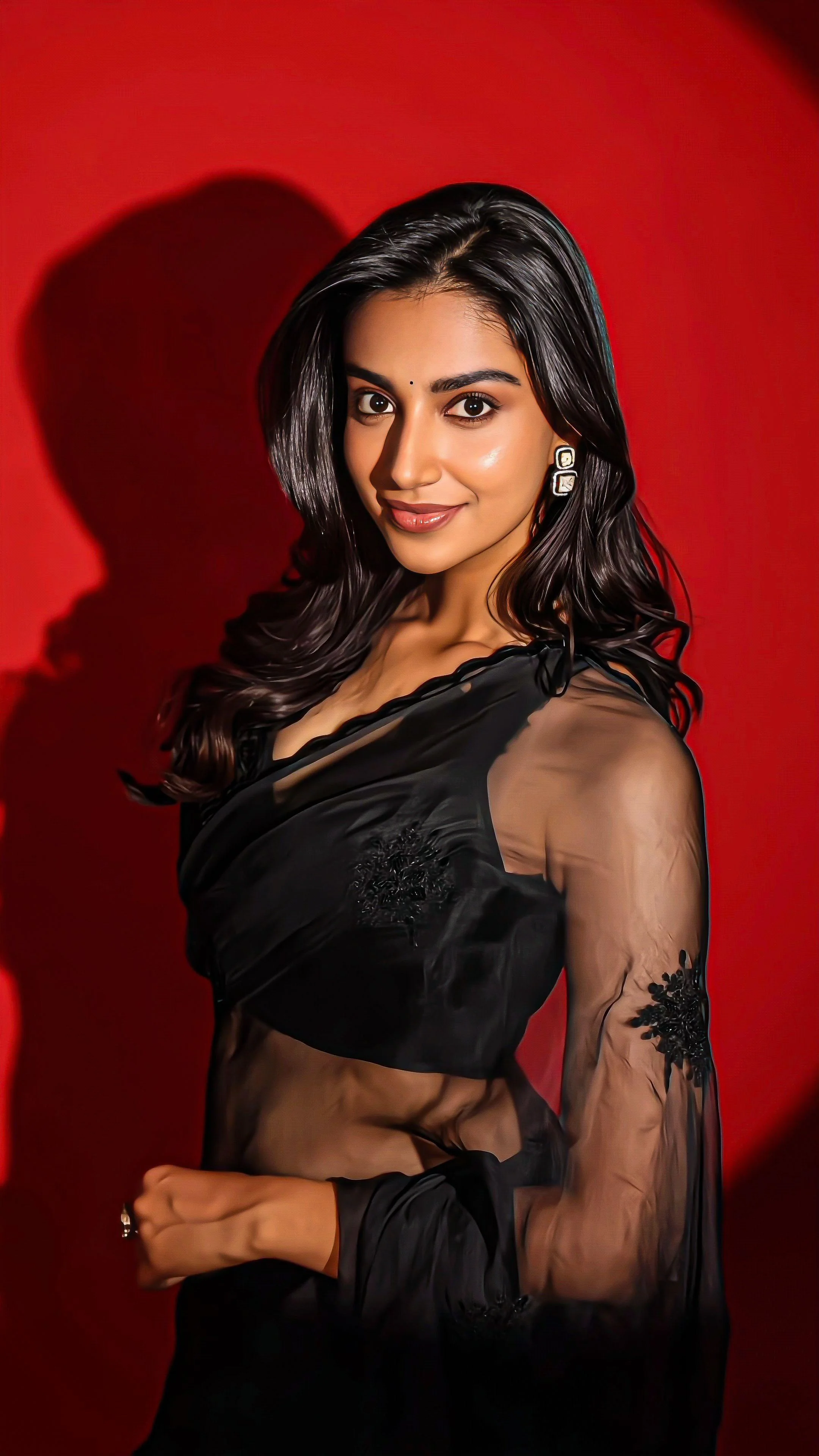 Meenakshi Chaudhary Black Saree Image