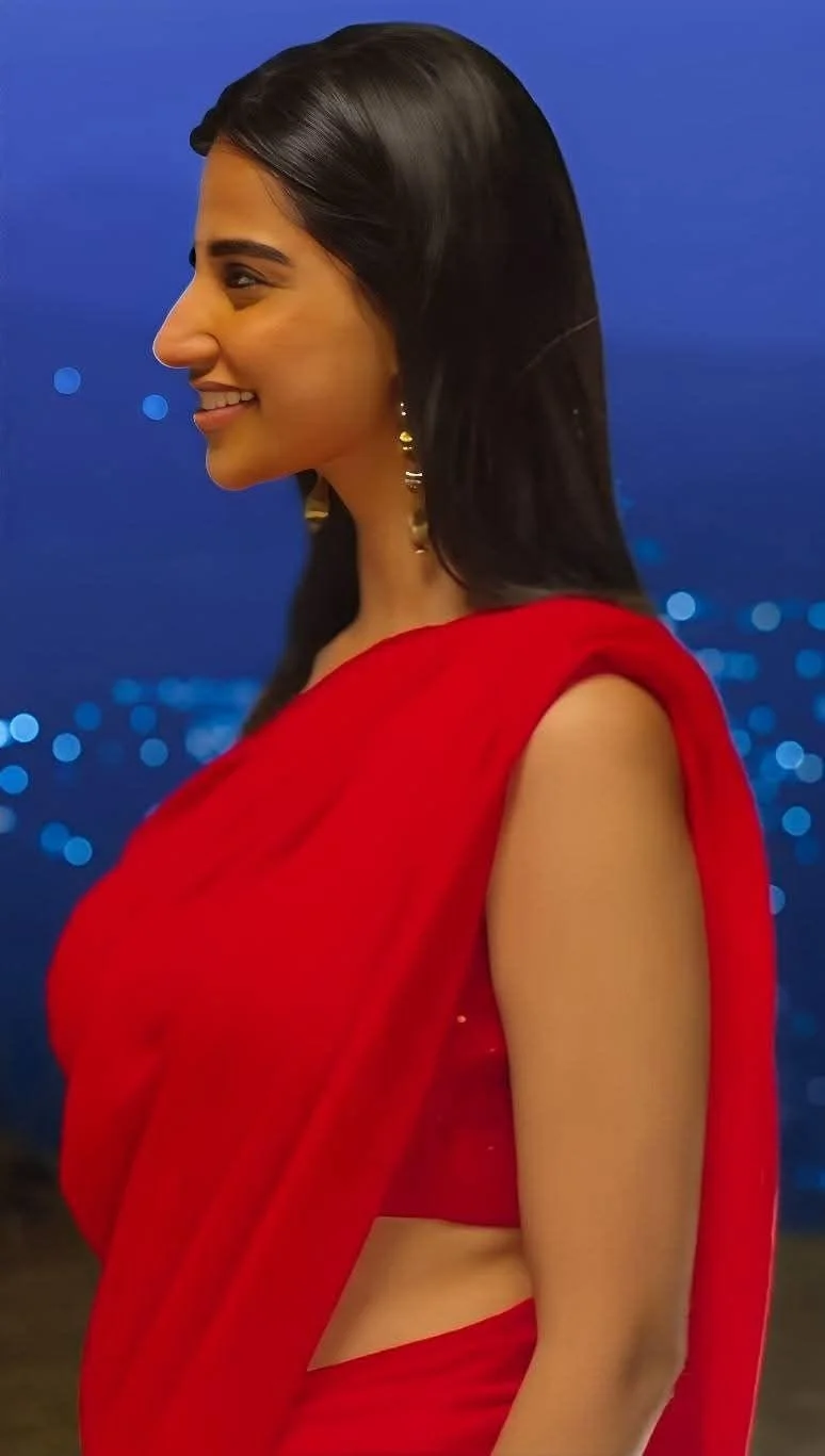 Meenakshi Chaudhary in Red Saree HD Wallpaper