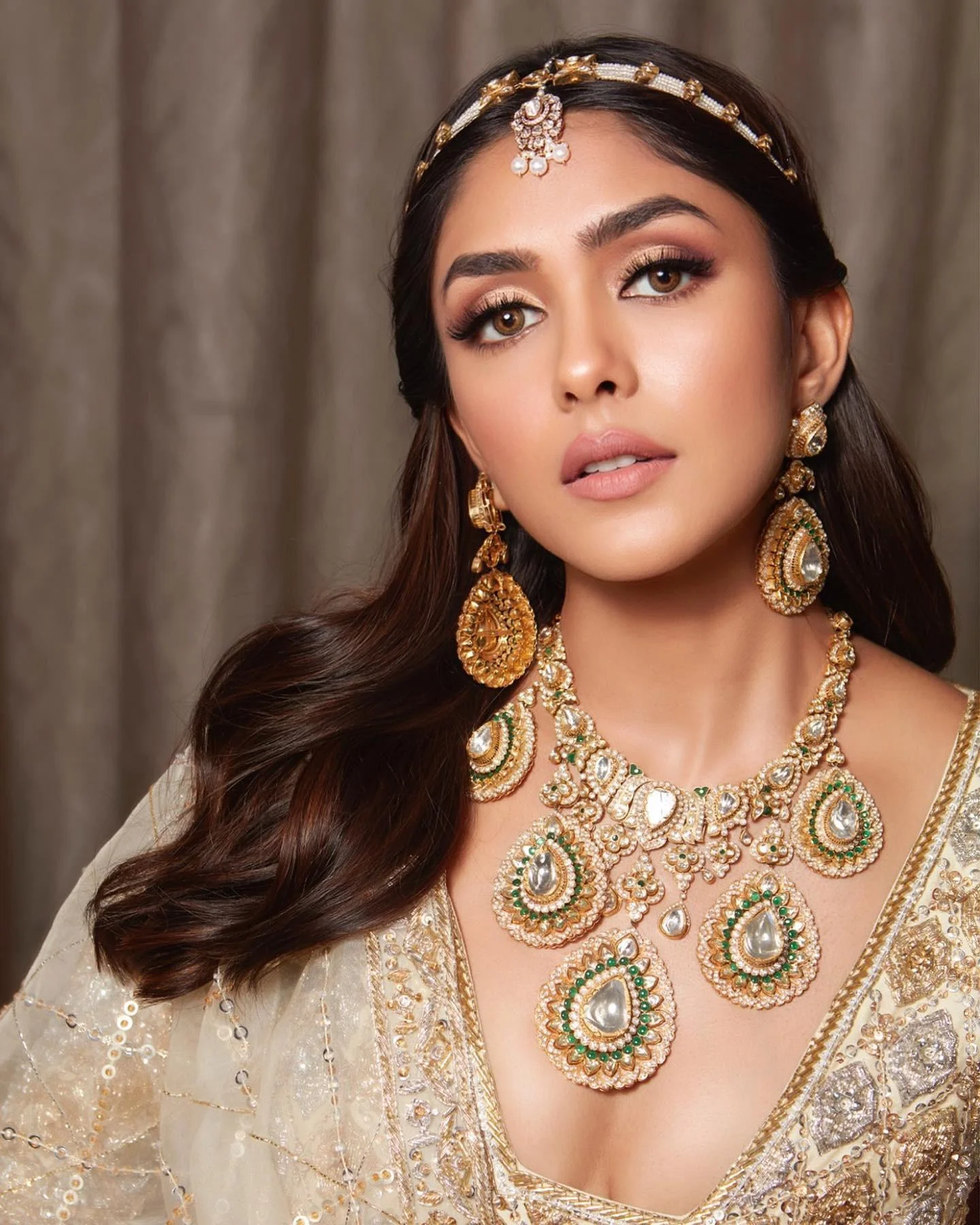Actress Mrunal Thakur Glows in Golden Bridal Lehenga Image