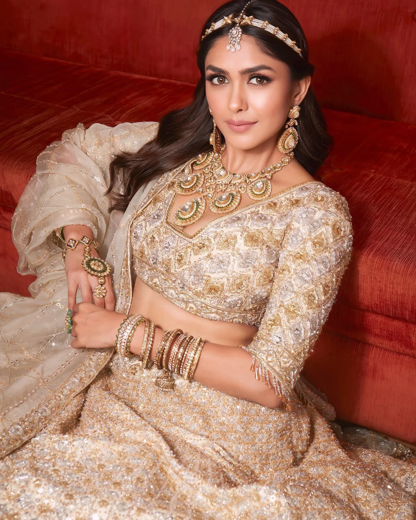 Actress Mrunal Thakur Glows in Golden Bridal Lehenga
