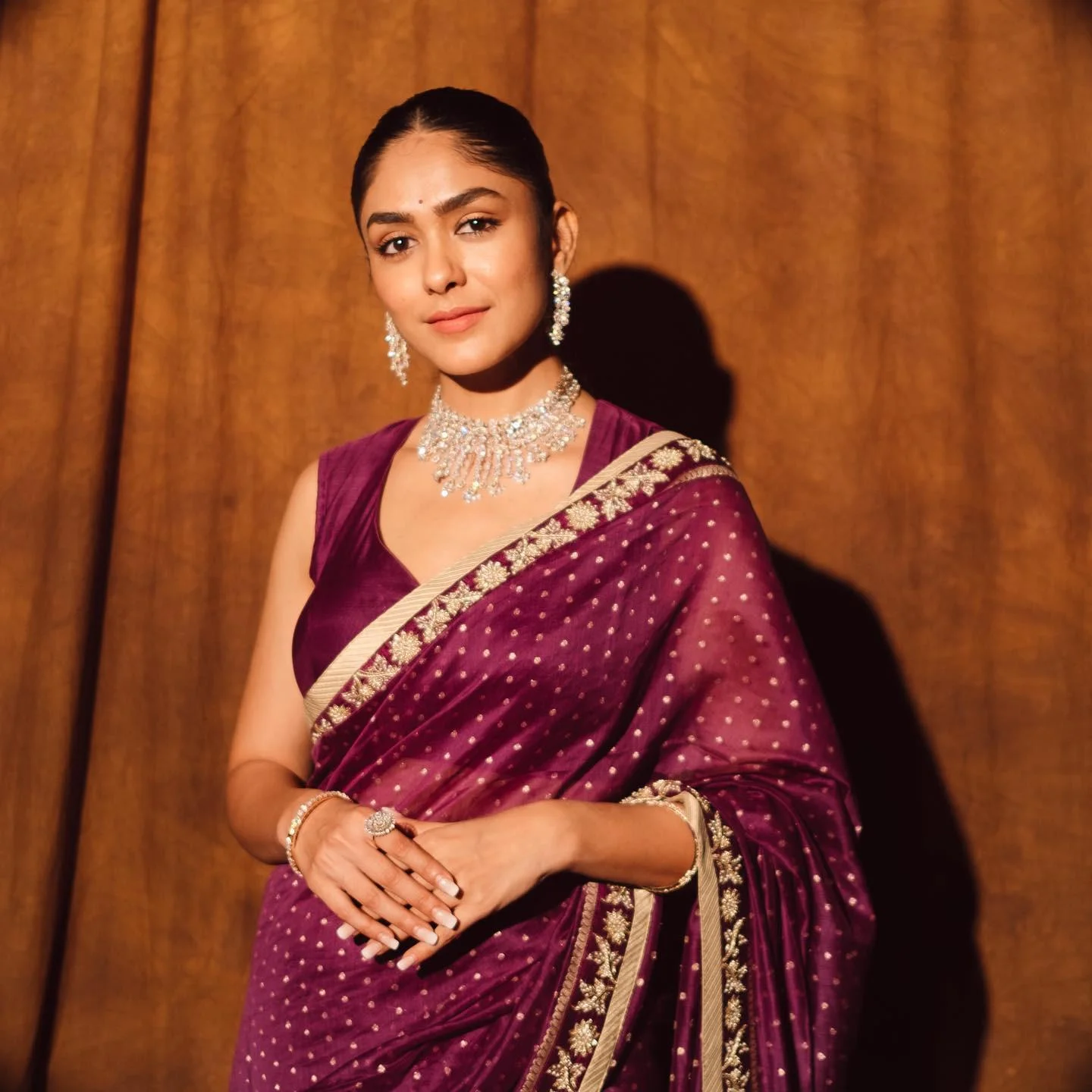Mrunal Thakur Glows in Elegant Purple Saree Hd Image