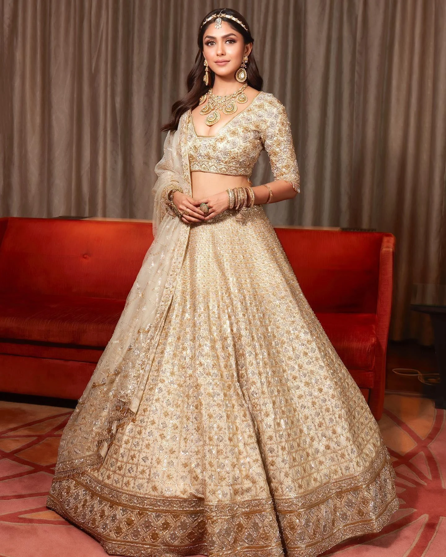 Mrunal Thakur Glows in Golden Bridal Lehenga Wallpaper