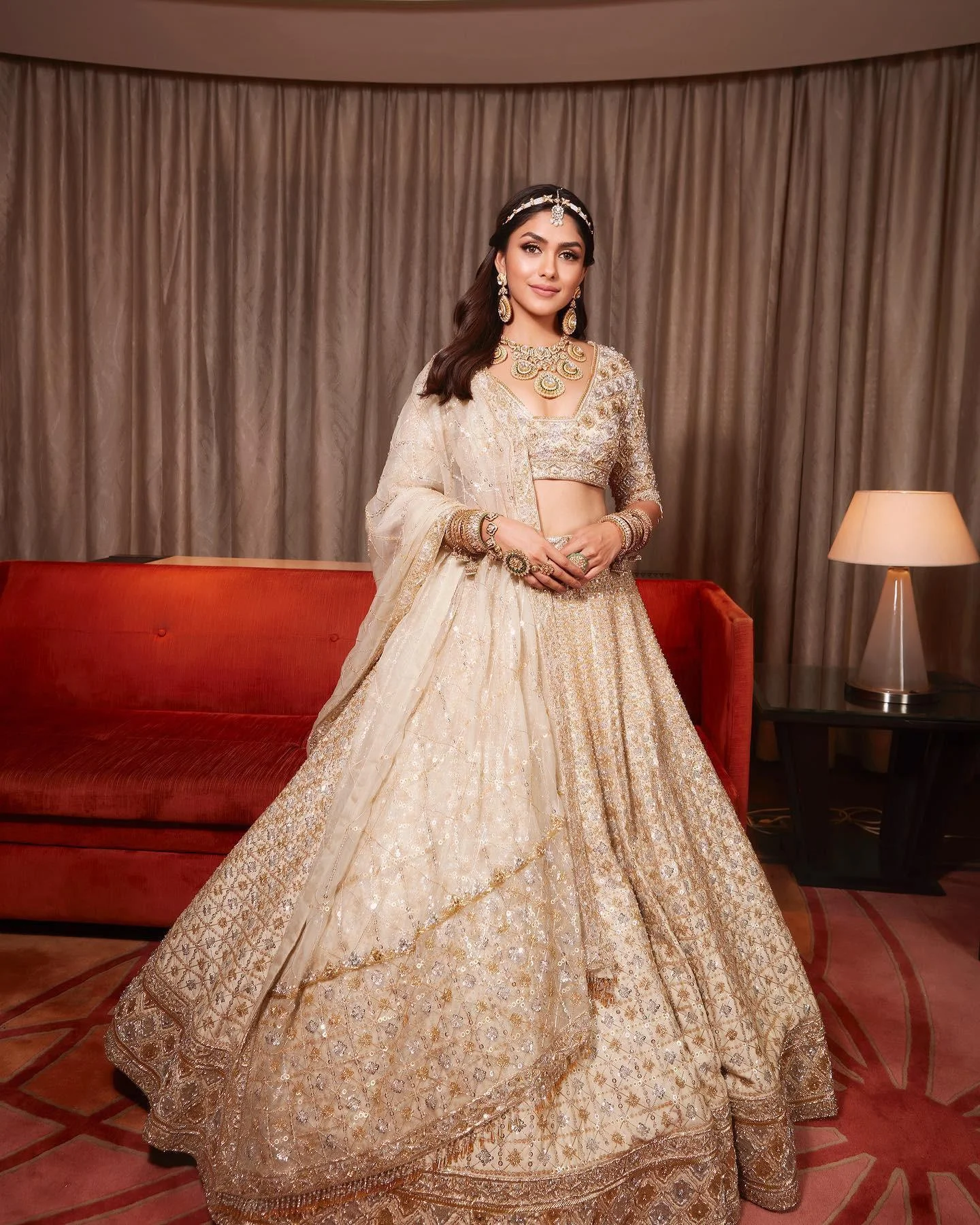Mrunal Thakur Glows in Regal Golden Bridal Lehenga