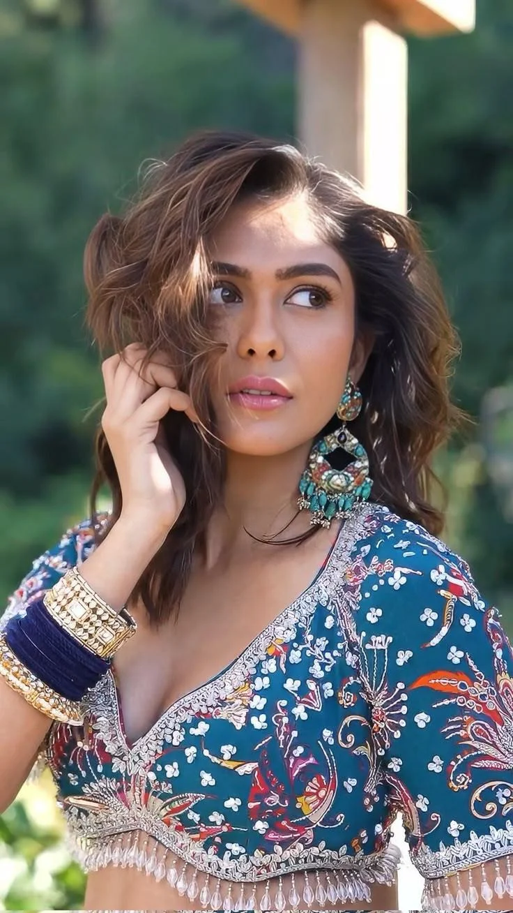 Mrunal Thakur Stuns in Embroidered Teal Ensemble Hd Image