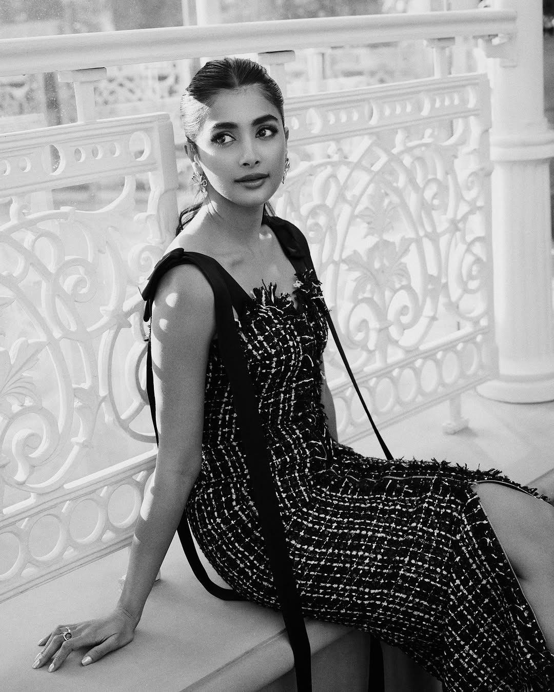 Black and White Portrait of Pooja Hegde Sitting Gracefully
