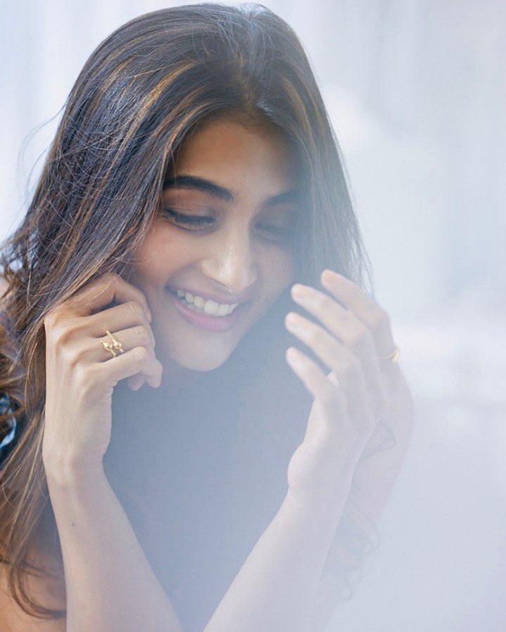Bright Smile of Pooja Hegde in Soft Focus Candid Shot