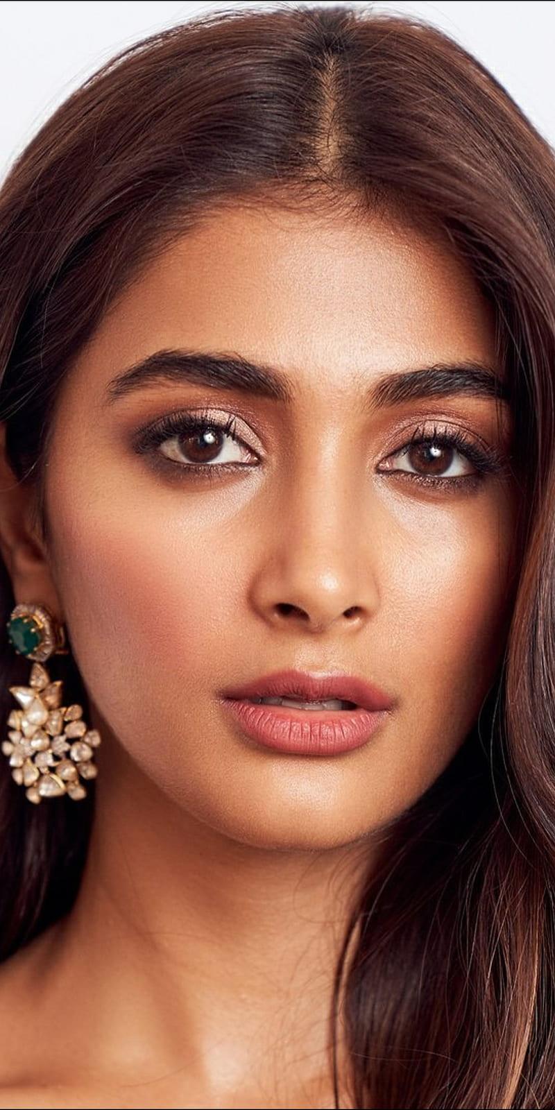 Close Up Portrait of Pooja Hegde with Earrings Image