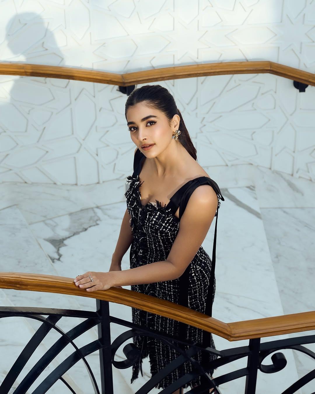 Elegant Pooja Hegde Wearing Black Dress on Staircase