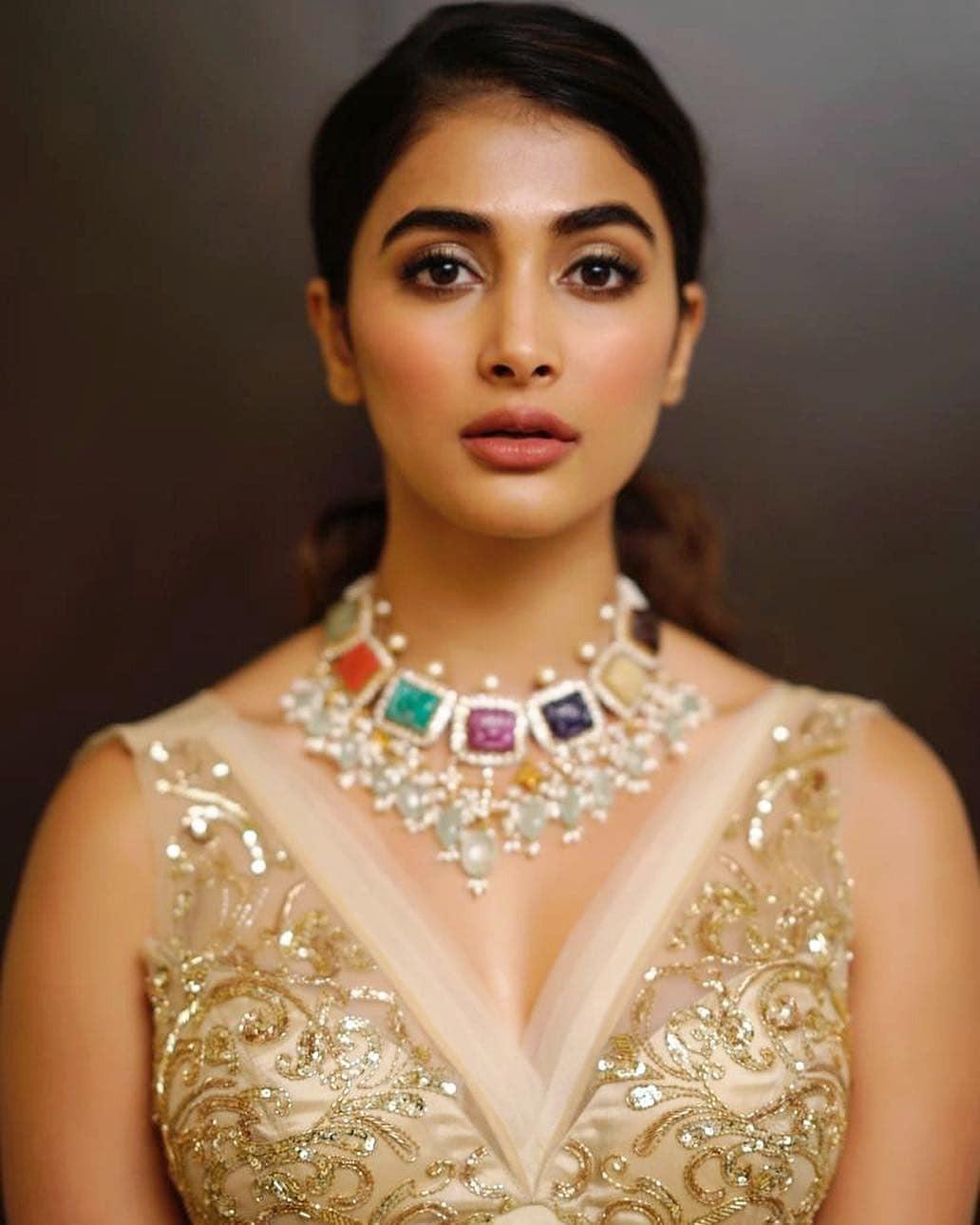 Glamorous Pooja Hegde in a Golden Embroidered Gown Image