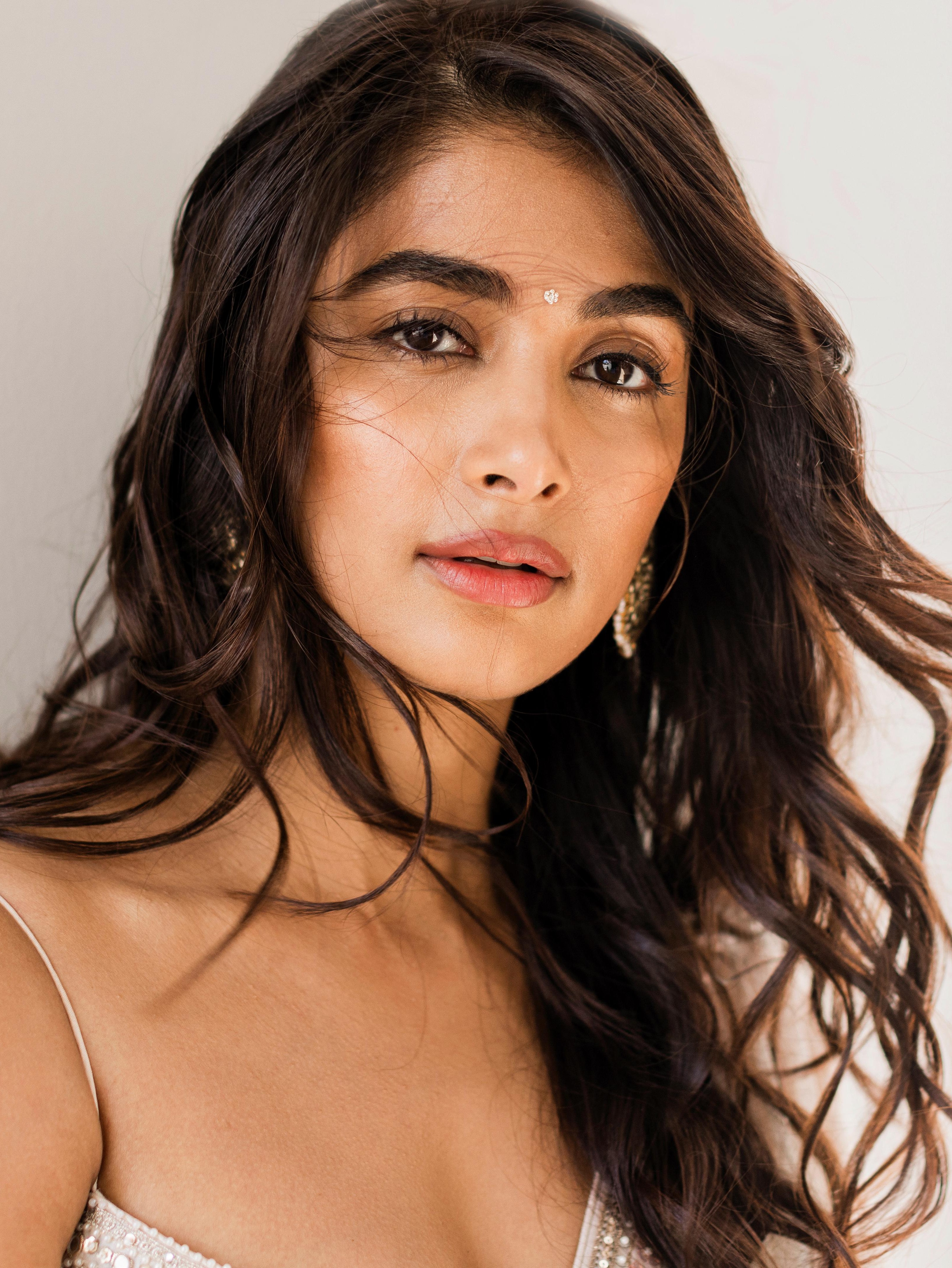 Natural Beauty of Pooja Hegde in Closeup with Flowing Hair