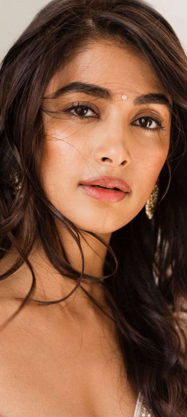 Pooja Hegde Closeup with Wavy Hair and Natural Makeup