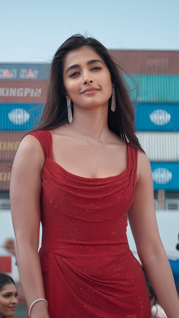 Pooja Hegde Dazzles in a Fitted Red Sleeveless Dress Image