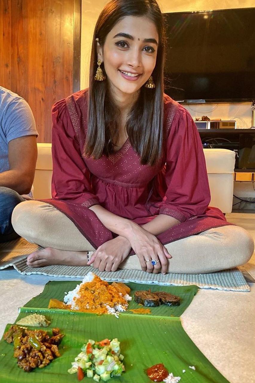 Pooja Hegde Enjoying a Traditional Meal on Banana Leaf