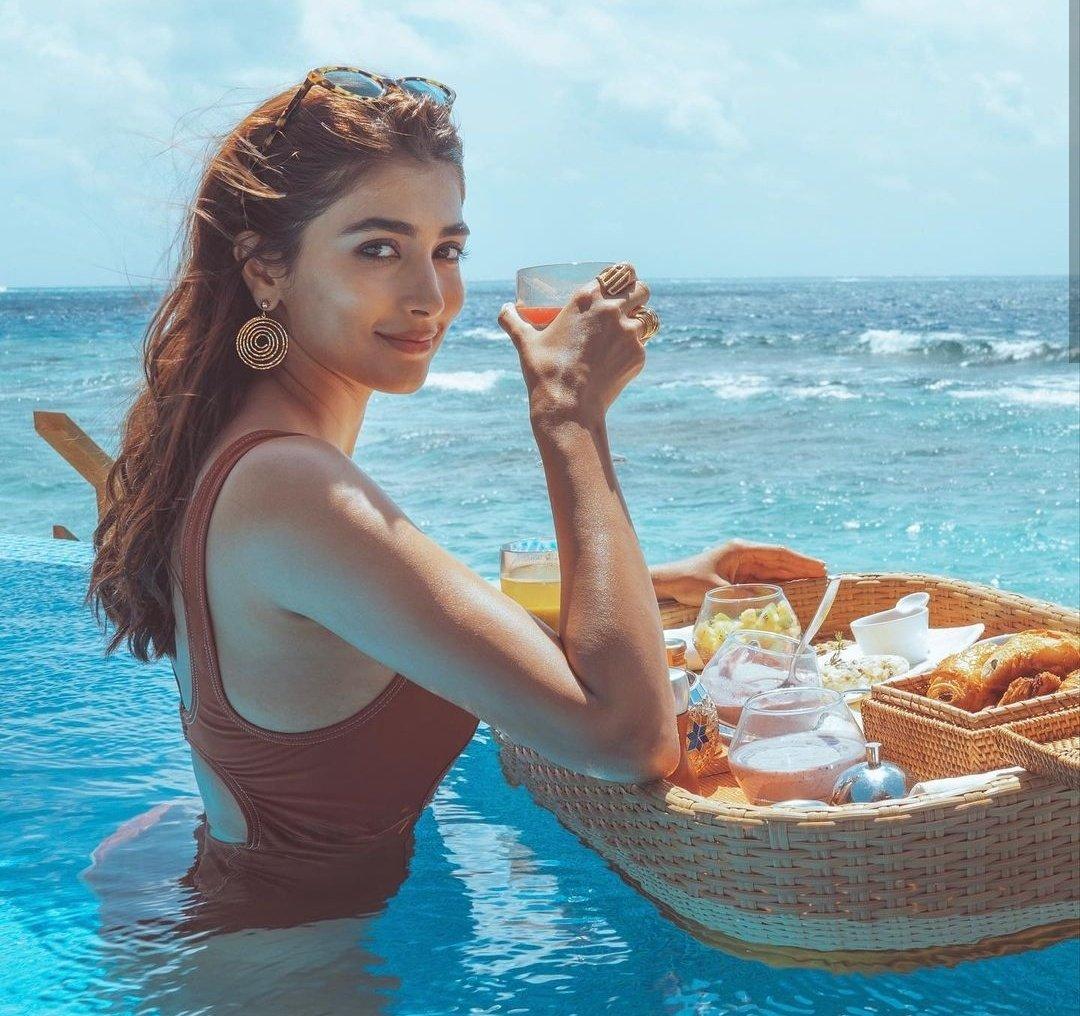 Pooja Hegde Enjoying Beachside Breakfast in Swimsuit