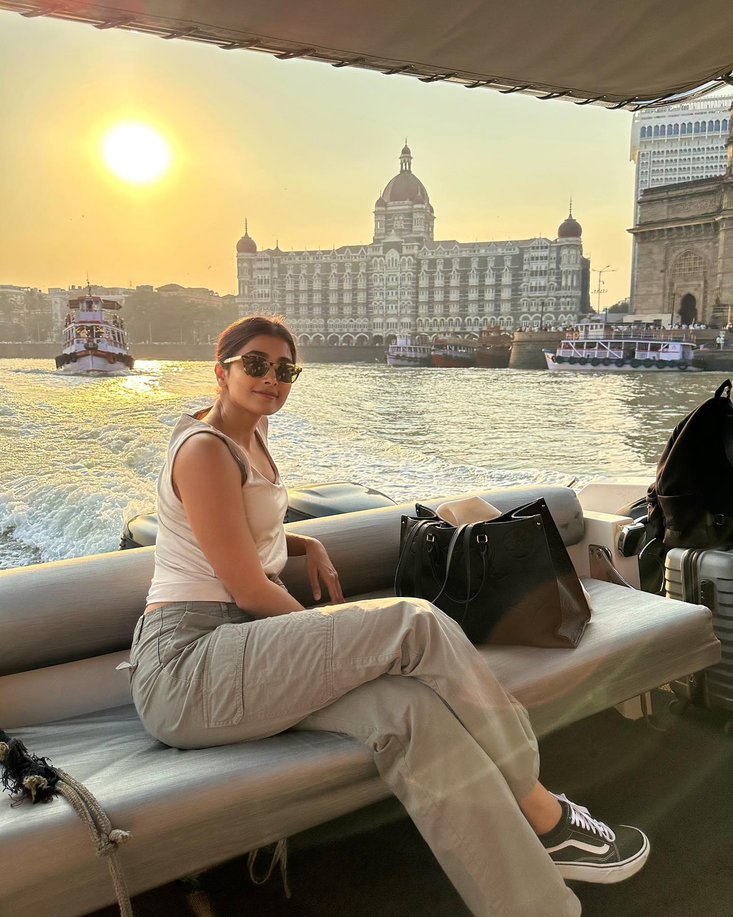 Pooja Hegde Enjoying Boat Ride with Scenic Sunset Backdrop