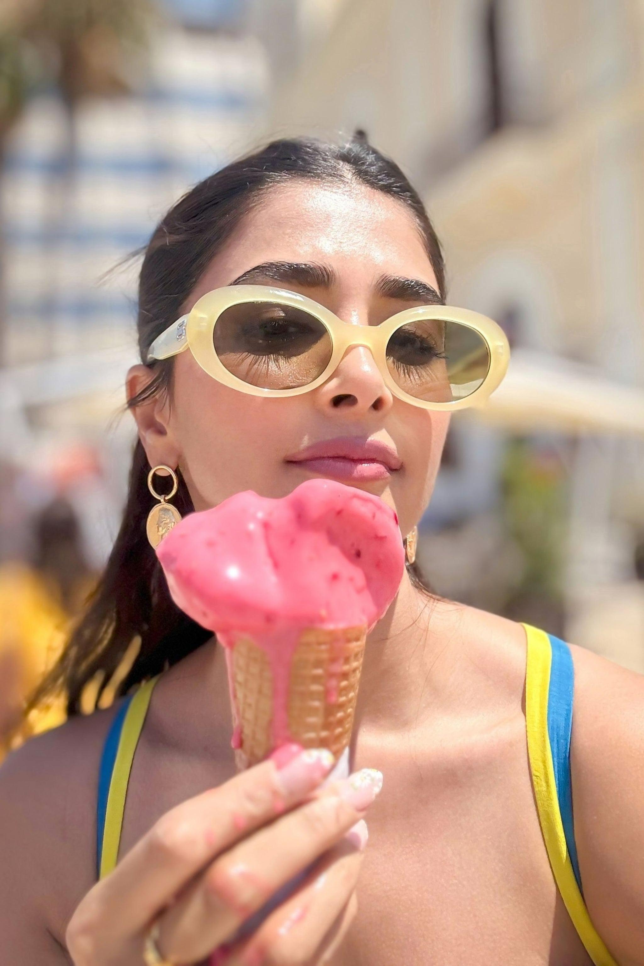 Pooja Hegde Enjoying Pink Ice Cream in Funky Glasses