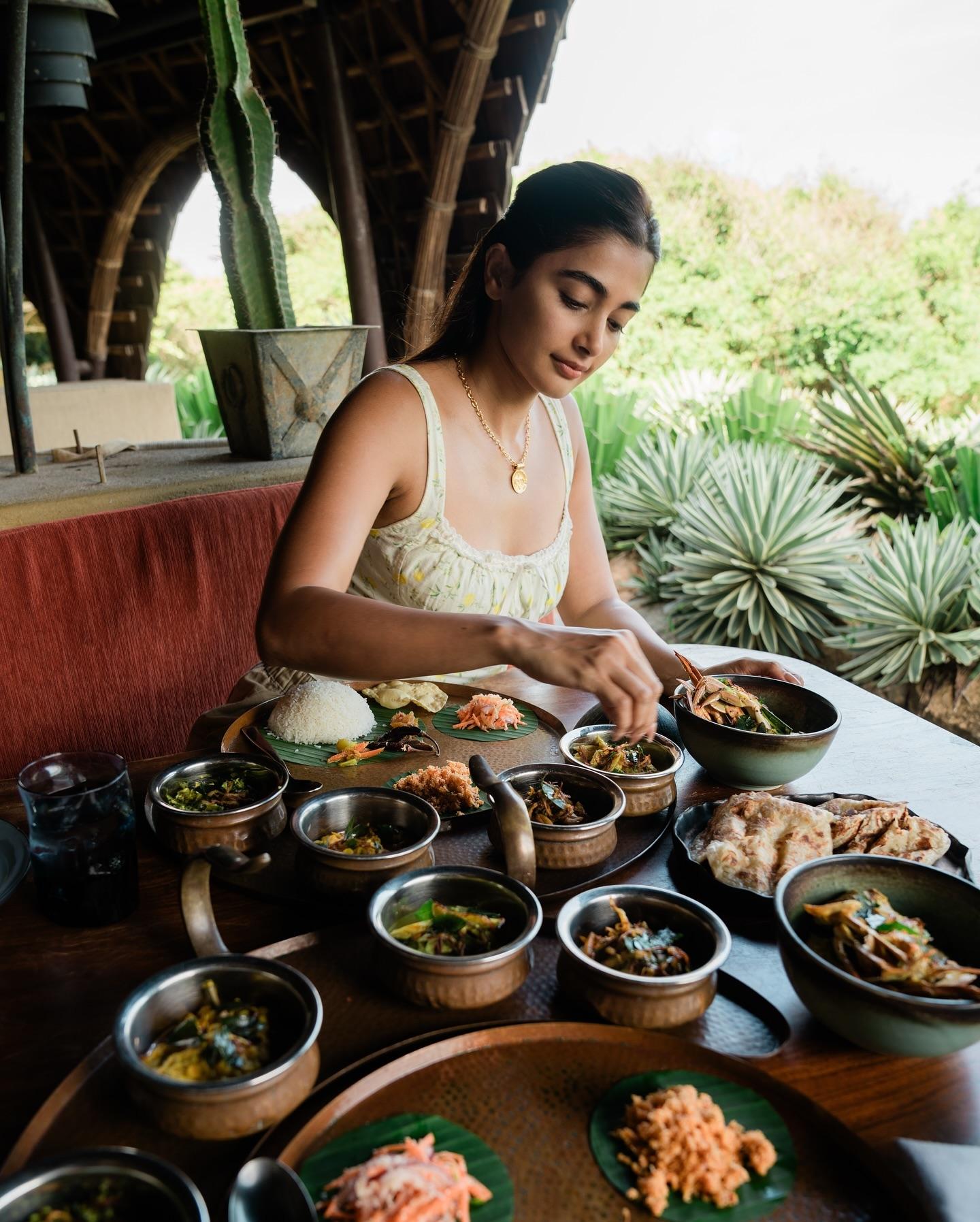 Pooja Hegde Enjoys a South Indian Meal Outdoors Image