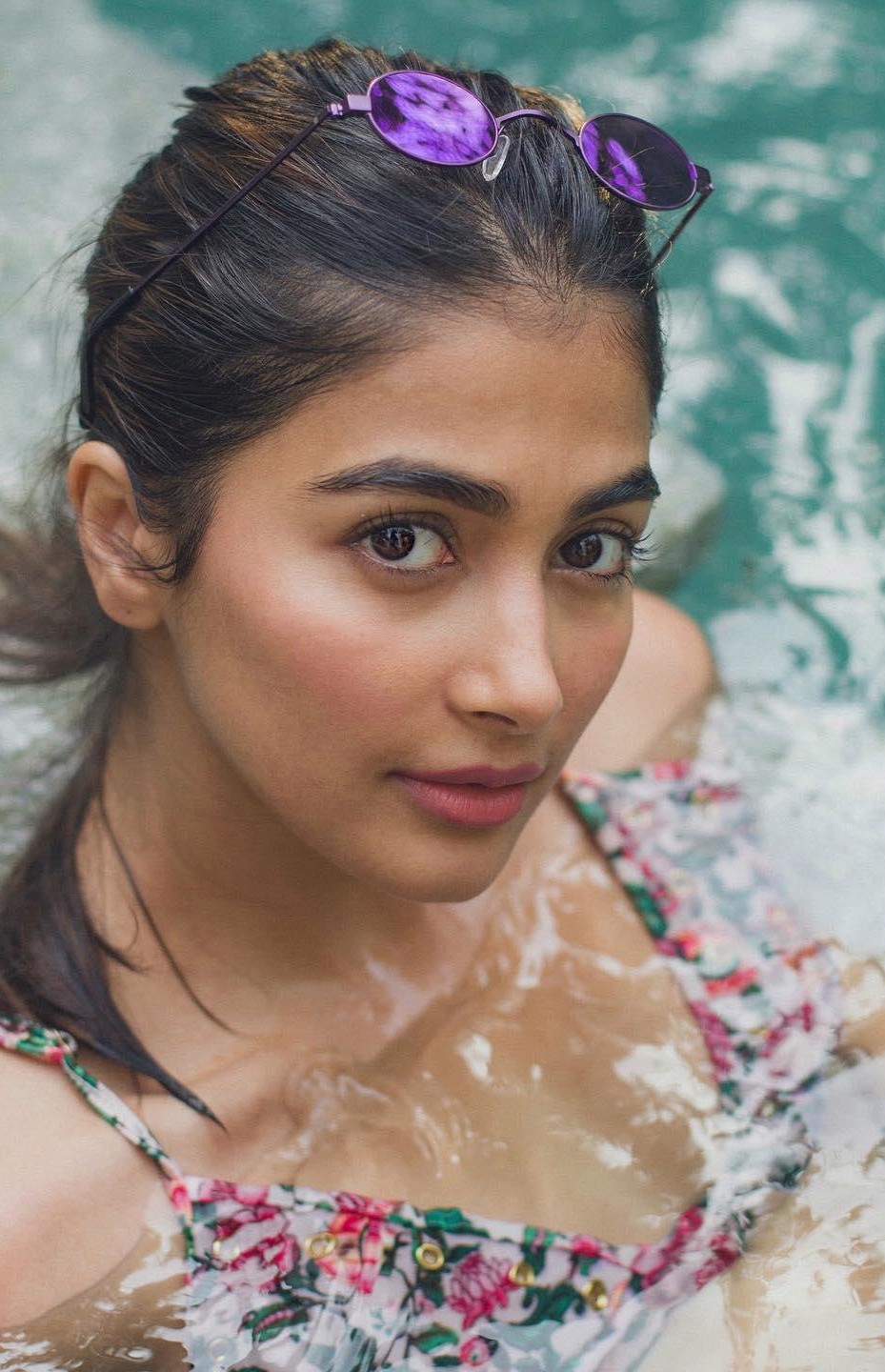Pooja Hegde Enjoys Poolside Moment with Wet Hair Look