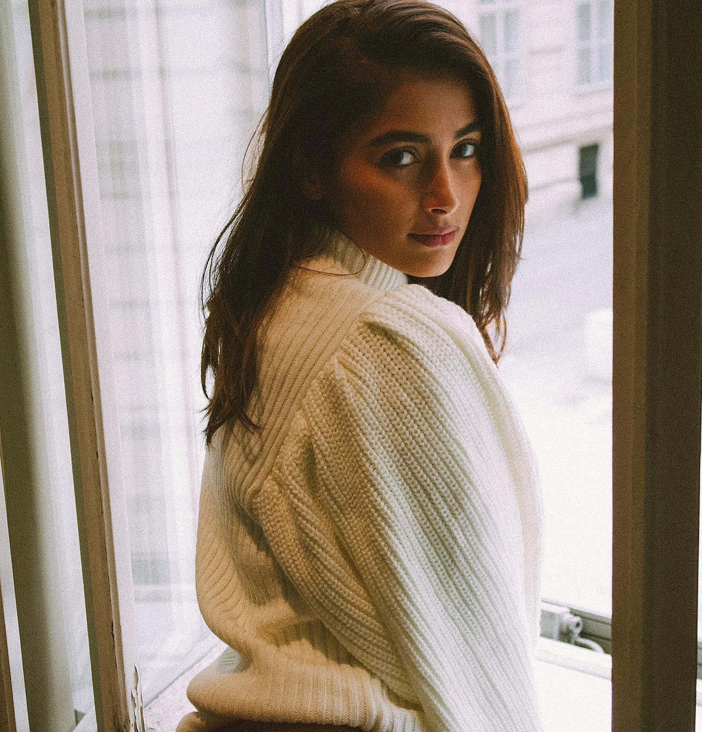 Pooja Hegde Glows in Cream Knit Sweater By Window