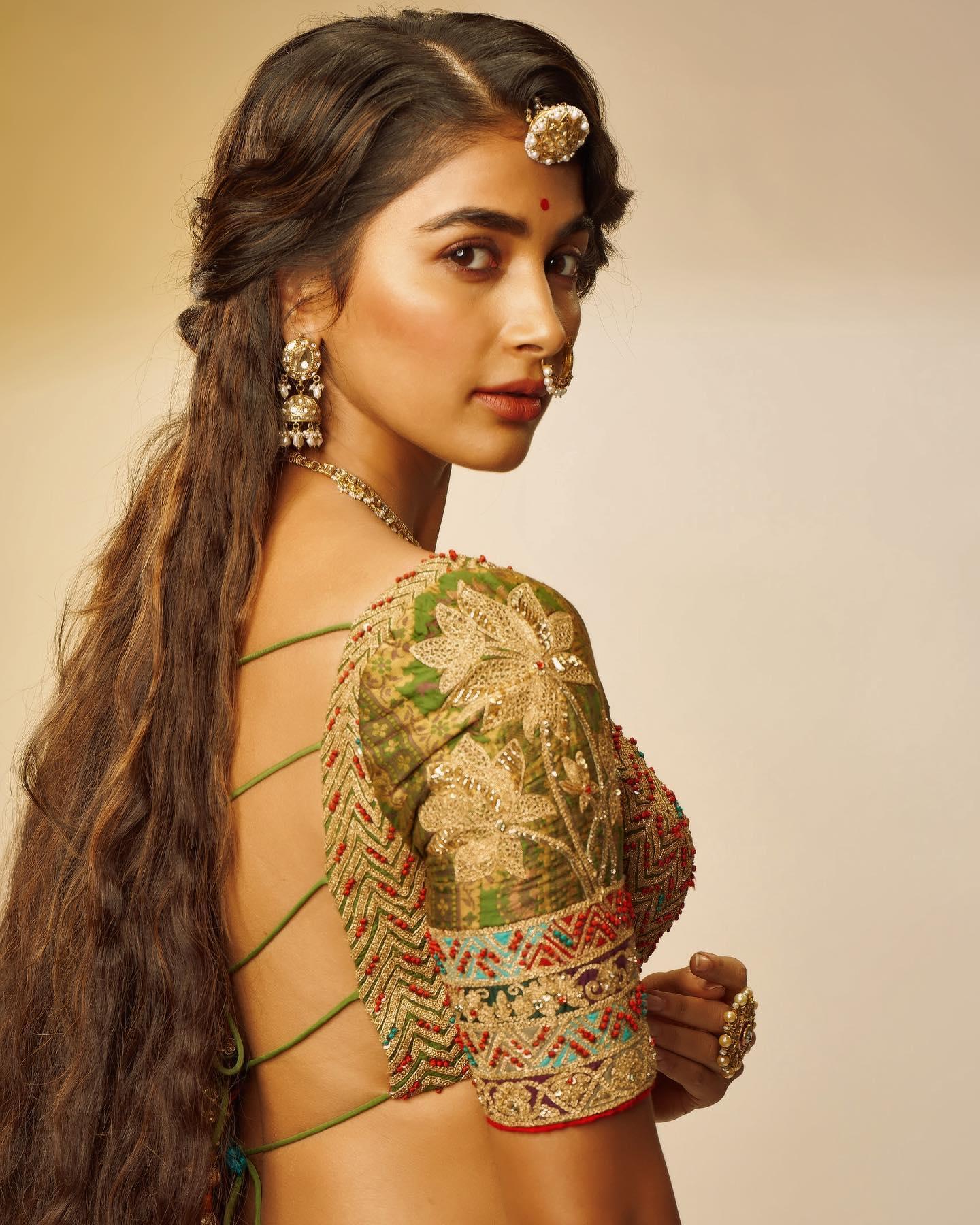 Pooja Hegde in Backless Blouse and Long Braid Look Wallpaper